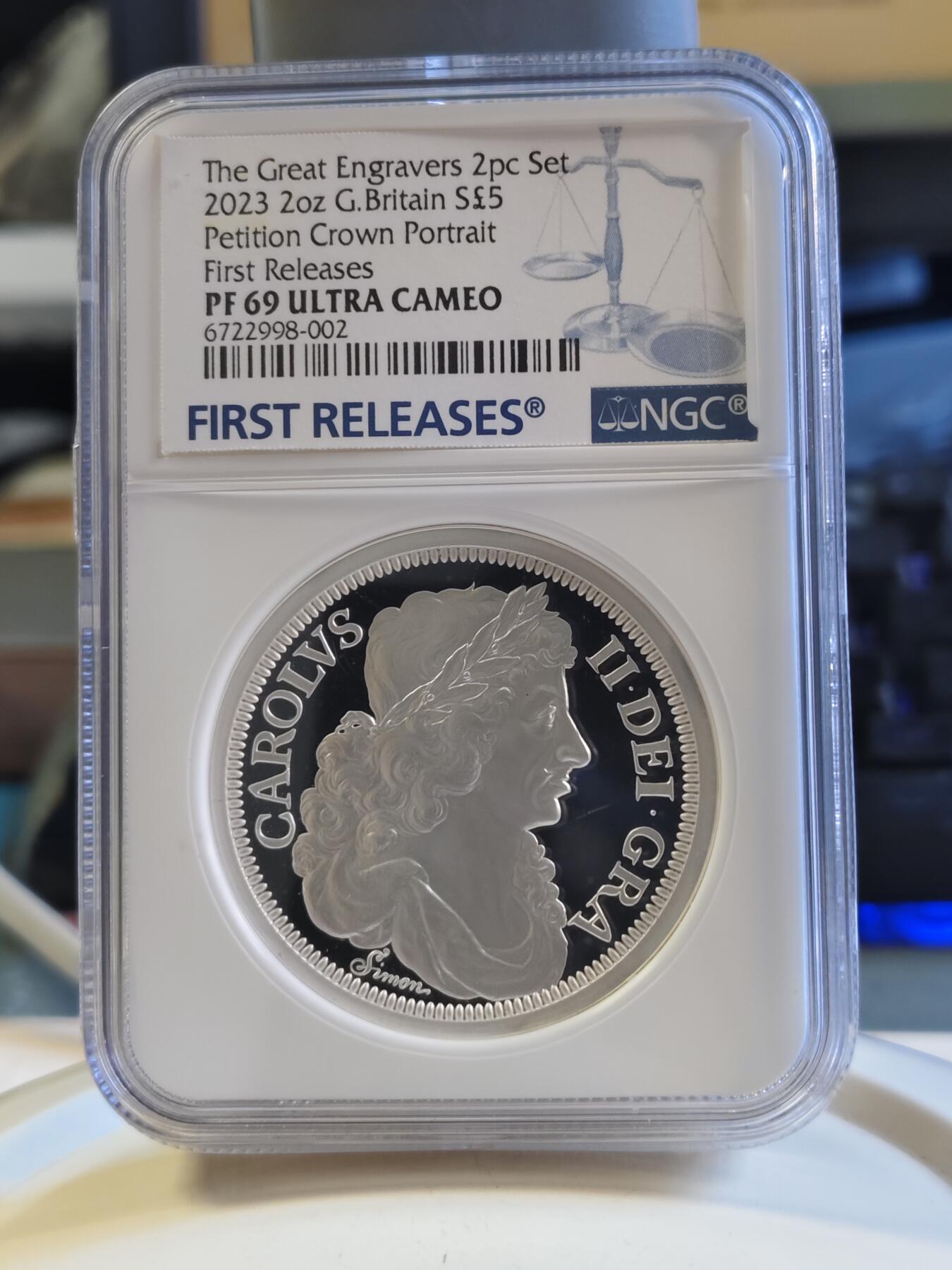 第179期拍卖【长期征集拍品】 2023年英国发行伟大的雕刻师西蒙请愿克朗5英镑精制纪念银币国王币NGC-PF69首，2盎司，999银