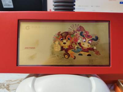 第180期拍卖【长期征集拍品】【北京币展专场】 - 中国建设银行发行，善建成长，CCTV春晚牛年压岁金钞，尺寸145*70毫米，999金，重800毫克（0.8克重金价728）