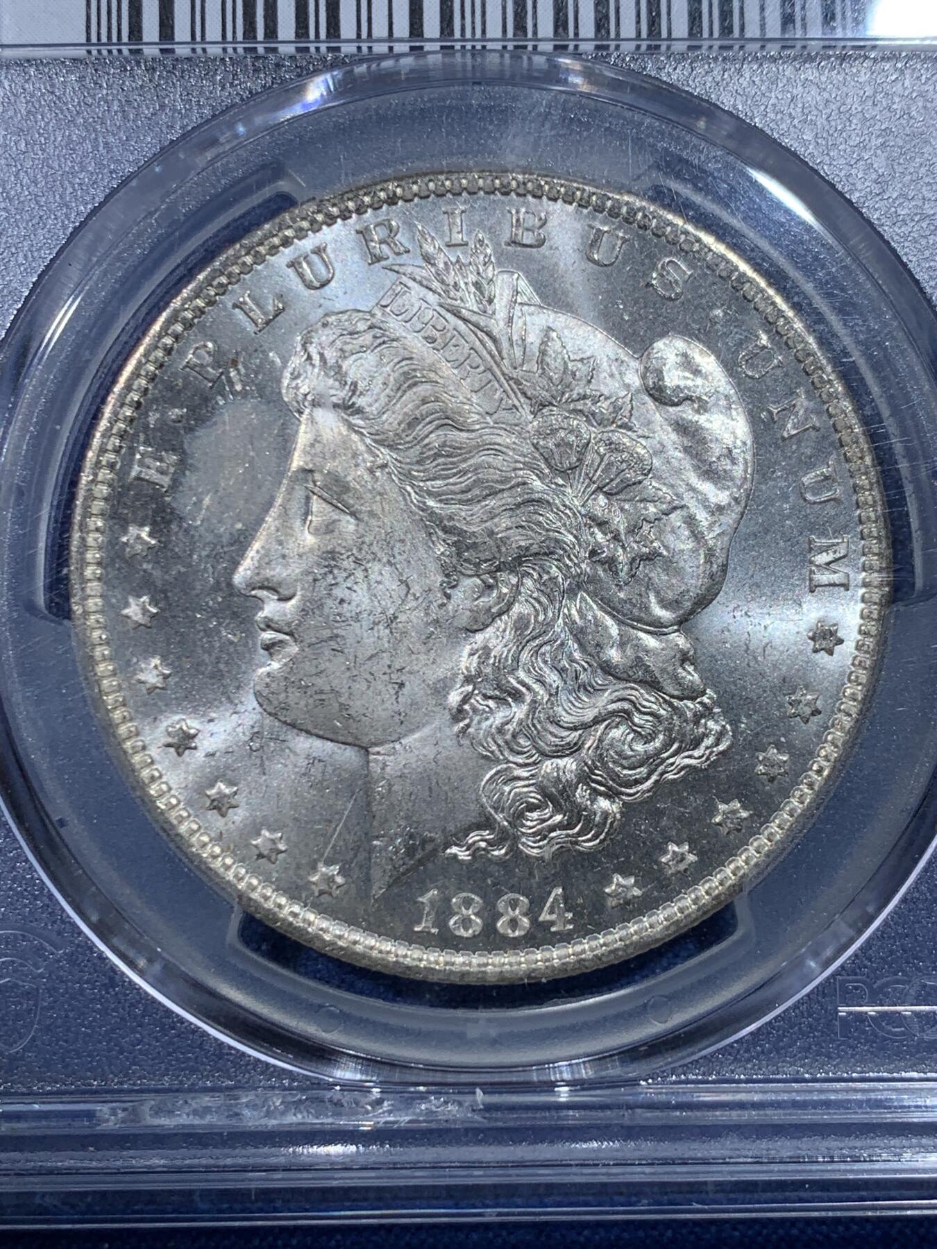 《竞宝斋》第432场 周日，周一 2场连拍 （全场包邮） PCGS MS63 美国1884-O摩根银币 转光品相底板好，盒子边沿小磕