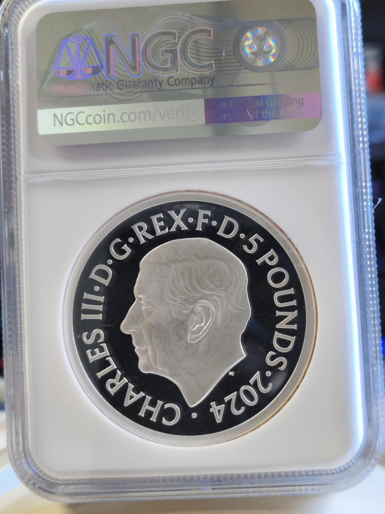 第179期拍卖【长期征集拍品】 2024年英国5镑 伟大雕刻师系列马剑精制纪念2盎司银币NGC PF69首期 蓝无盒证书。2盎司，999银