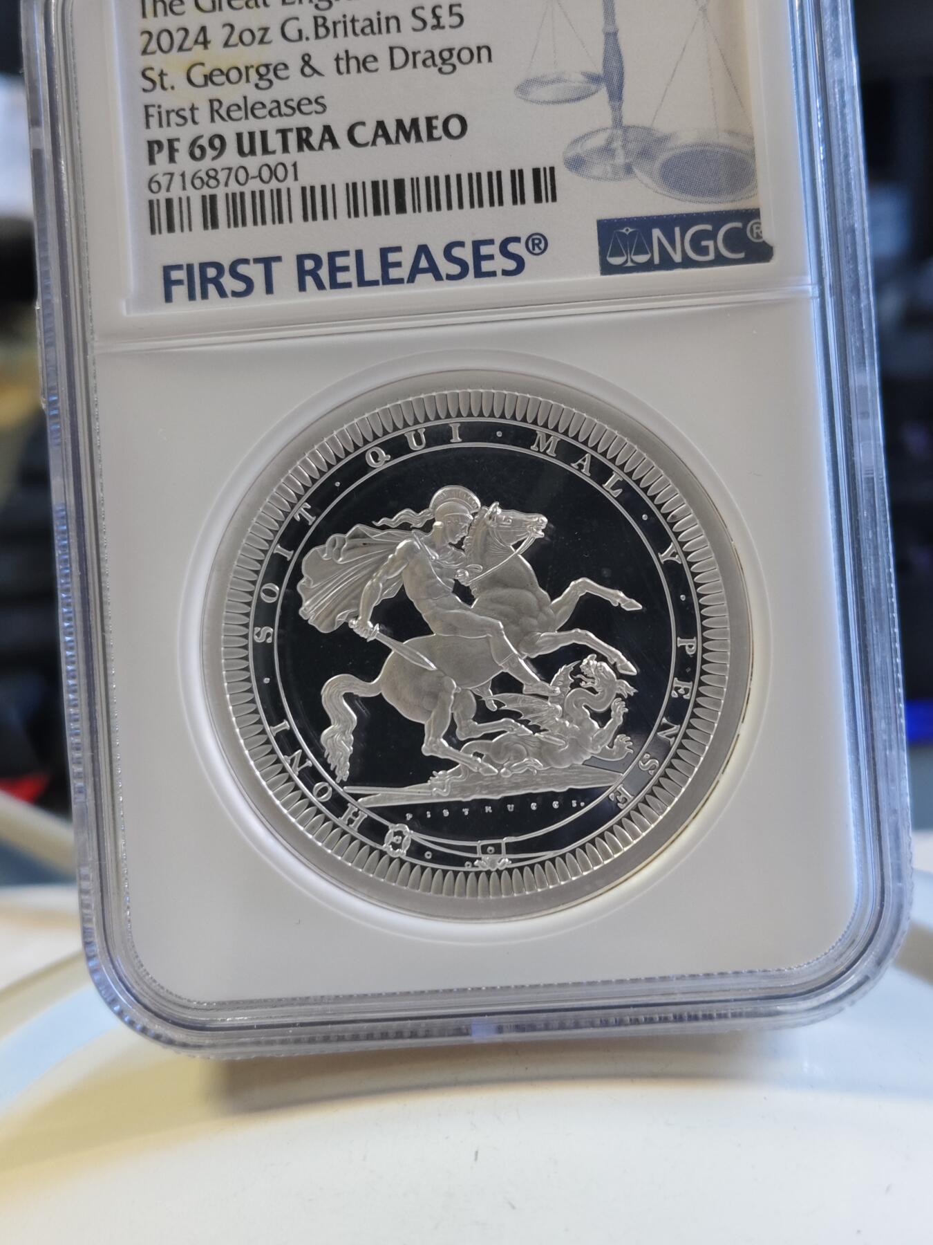 第179期拍卖【长期征集拍品】 2024年英国5镑 伟大雕刻师系列马剑精制纪念2盎司银币NGC PF69首期 蓝无盒证书。2盎司，999银