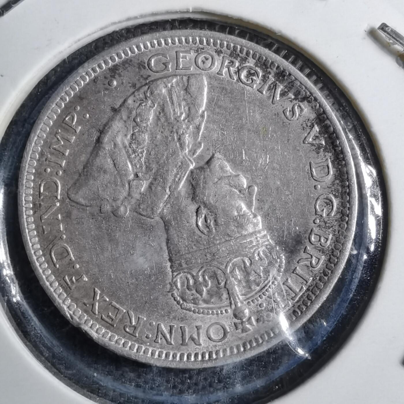 沼泽如烟--第887场 英属西非1914年6便士银币