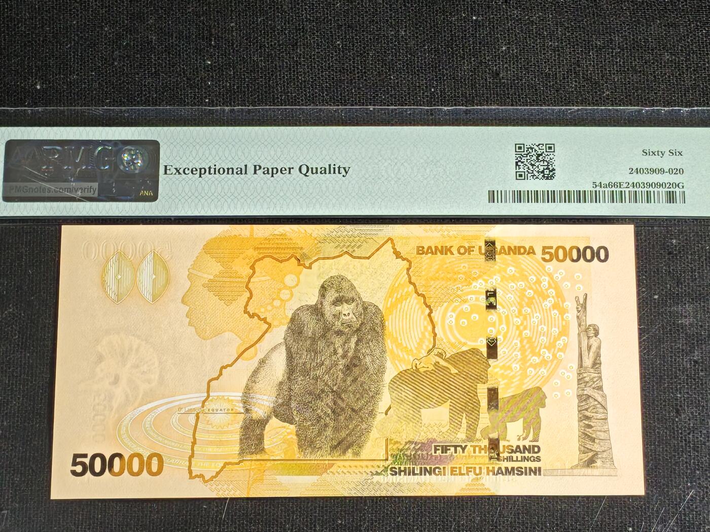 刘世昌艺术品销售中心～虎踞龙蟠*金杨在线联拍群第508期 乌干达2010年5万先令（PMG    66E    号码：AF2788516）1枚。此币荣获当年IBNS“世界最佳纸币”大奖。