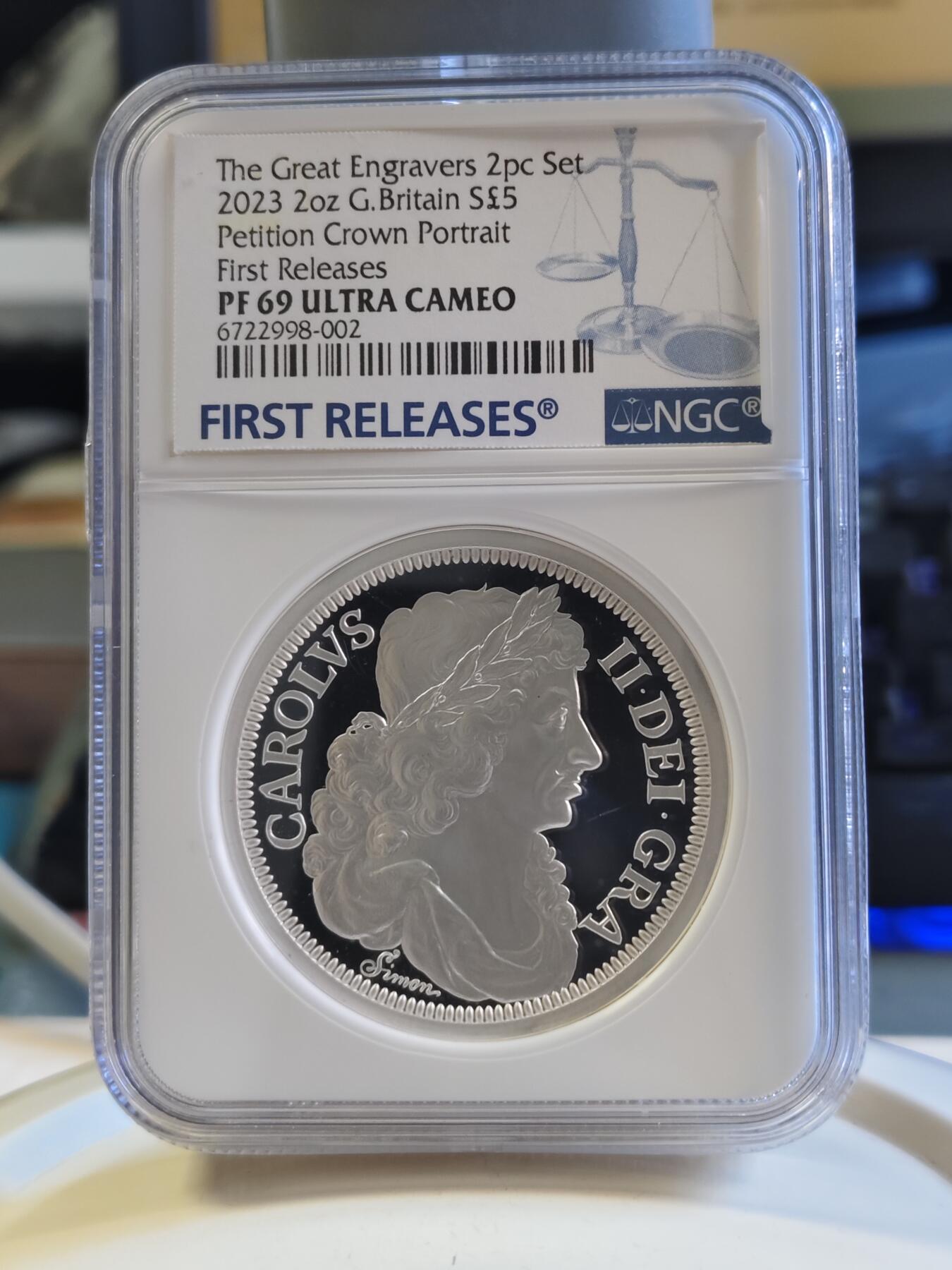 第179期拍卖【长期征集拍品】 2023年英国发行伟大的雕刻师西蒙请愿克朗5英镑精制纪念银币国王币NGC-PF69首，2盎司，999银