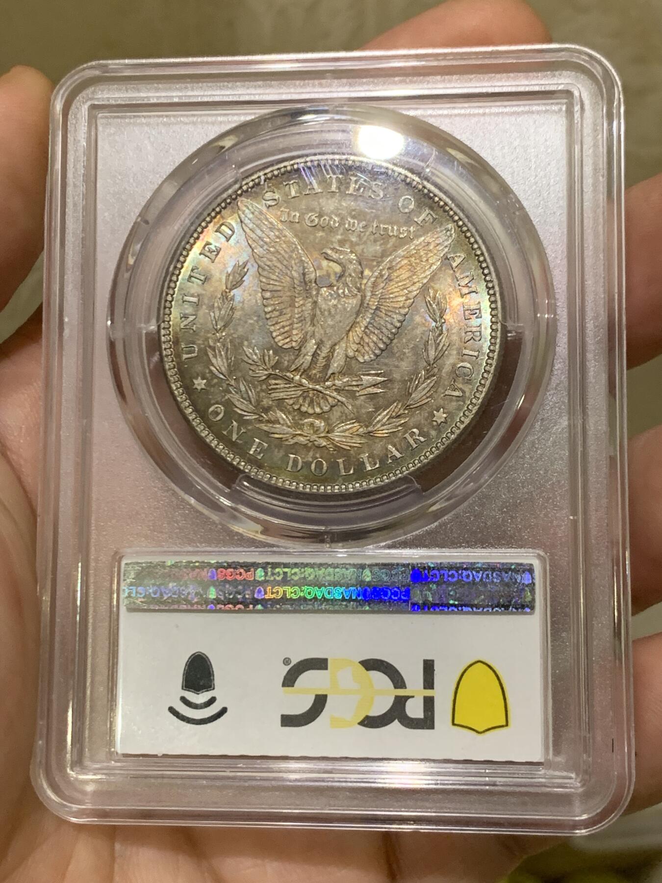《竞宝斋》第433场 周日，周一 2场连拍 （全场包邮） PCGS MS65 美国1885年摩根银币P版，原汁原味双面五彩老包浆，包浆醇厚润泽又犀利，打制深峻，转光强烈细节优秀，状态一流。
