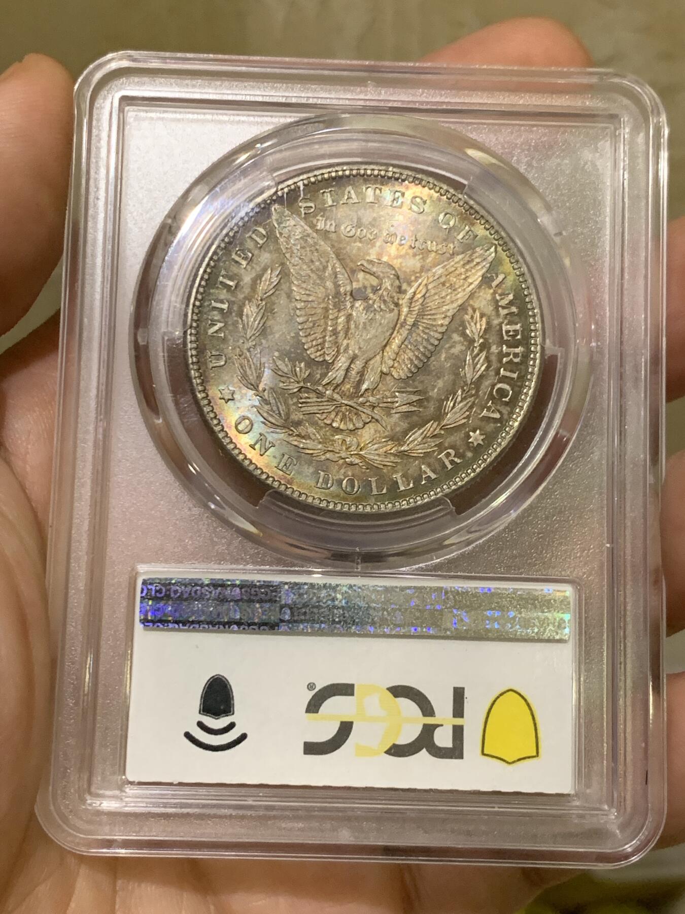 《竞宝斋》第433场 周日，周一 2场连拍 （全场包邮） PCGS MS65 美国1885年摩根银币P版，原汁原味双面五彩老包浆，包浆醇厚润泽又犀利，打制深峻，转光强烈细节优秀，状态一流。