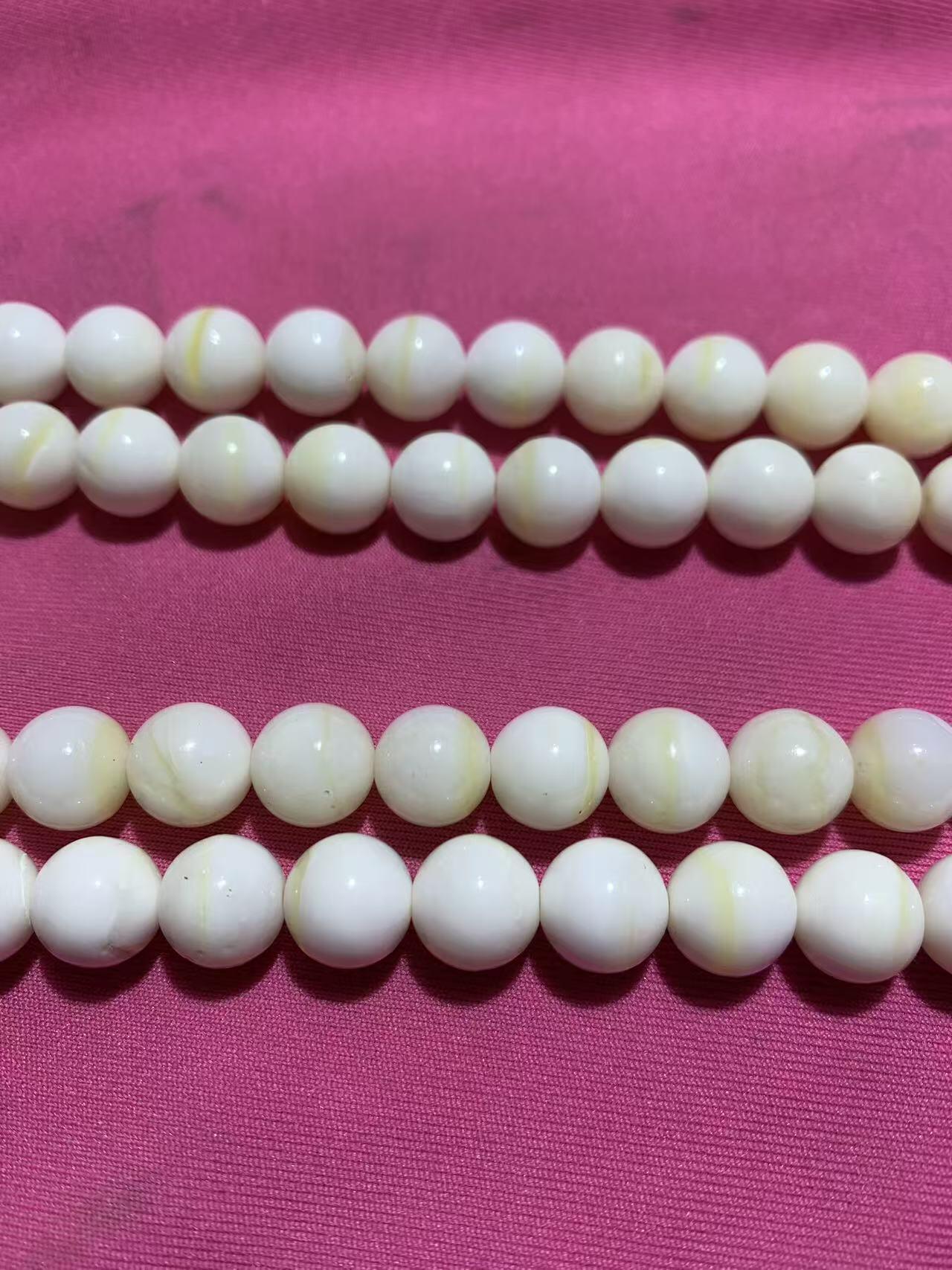 深海奶白飘黄贝金丝化玉108手串一条，