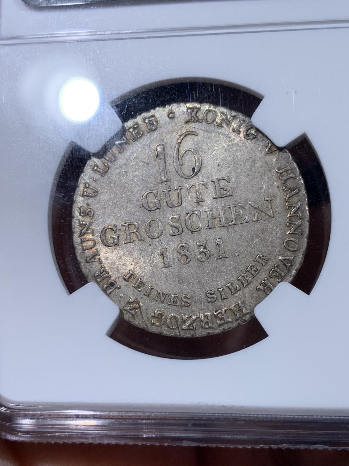 《竞宝斋》第433场 周日，周一 2场连拍 （全场包邮） NGC MS63 德国1831年汉诺威飞马16格罗申银币，稀见状态，银底蕴含着光彩，63分值得收藏。盒子侧面小磕