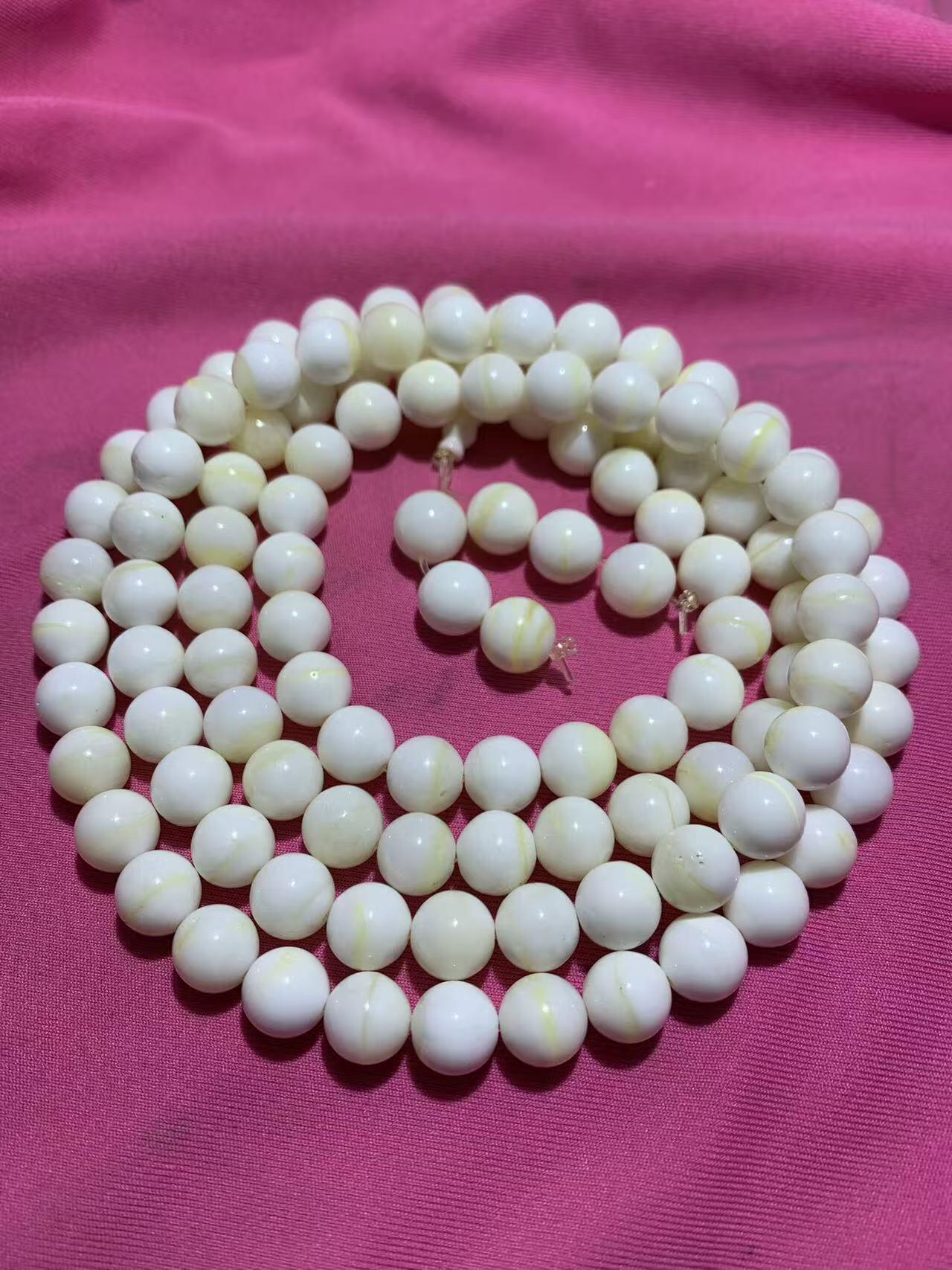 深海奶白飘黄贝金丝化玉108手串一条，