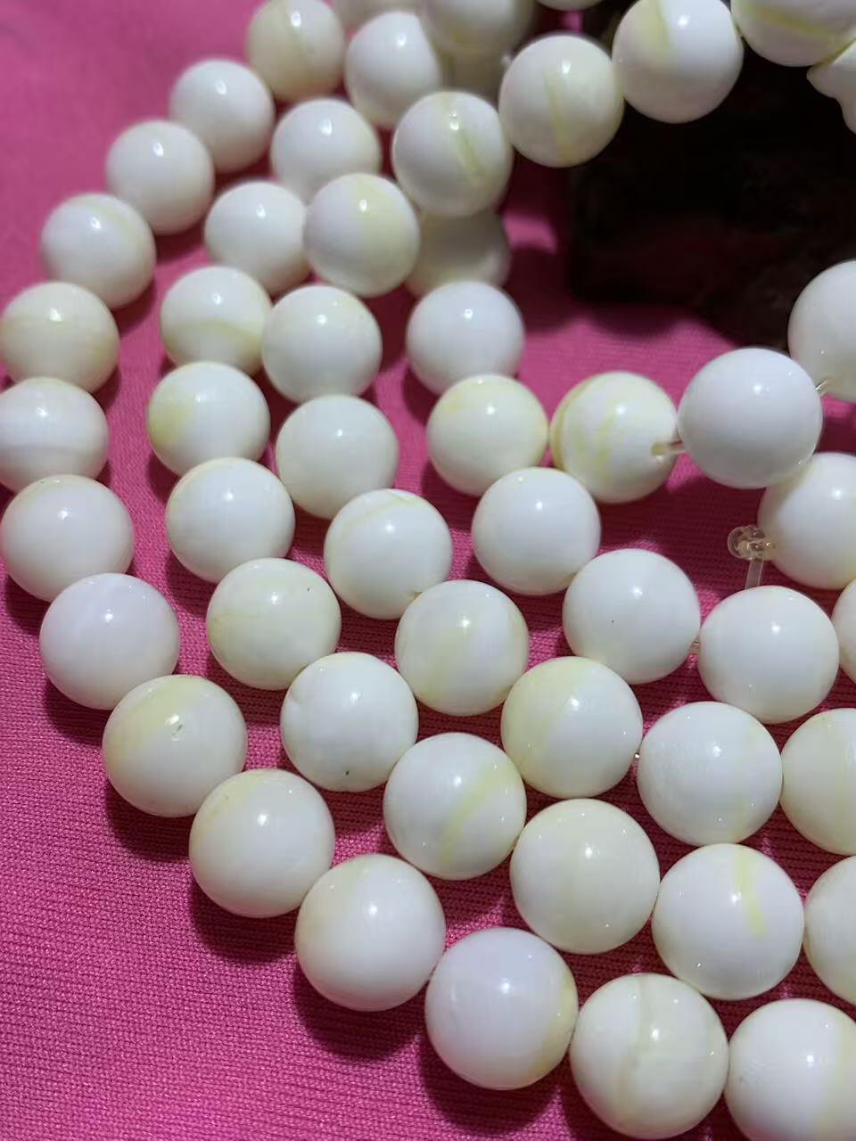 深海奶白飘黄贝金丝化玉108手串一条，