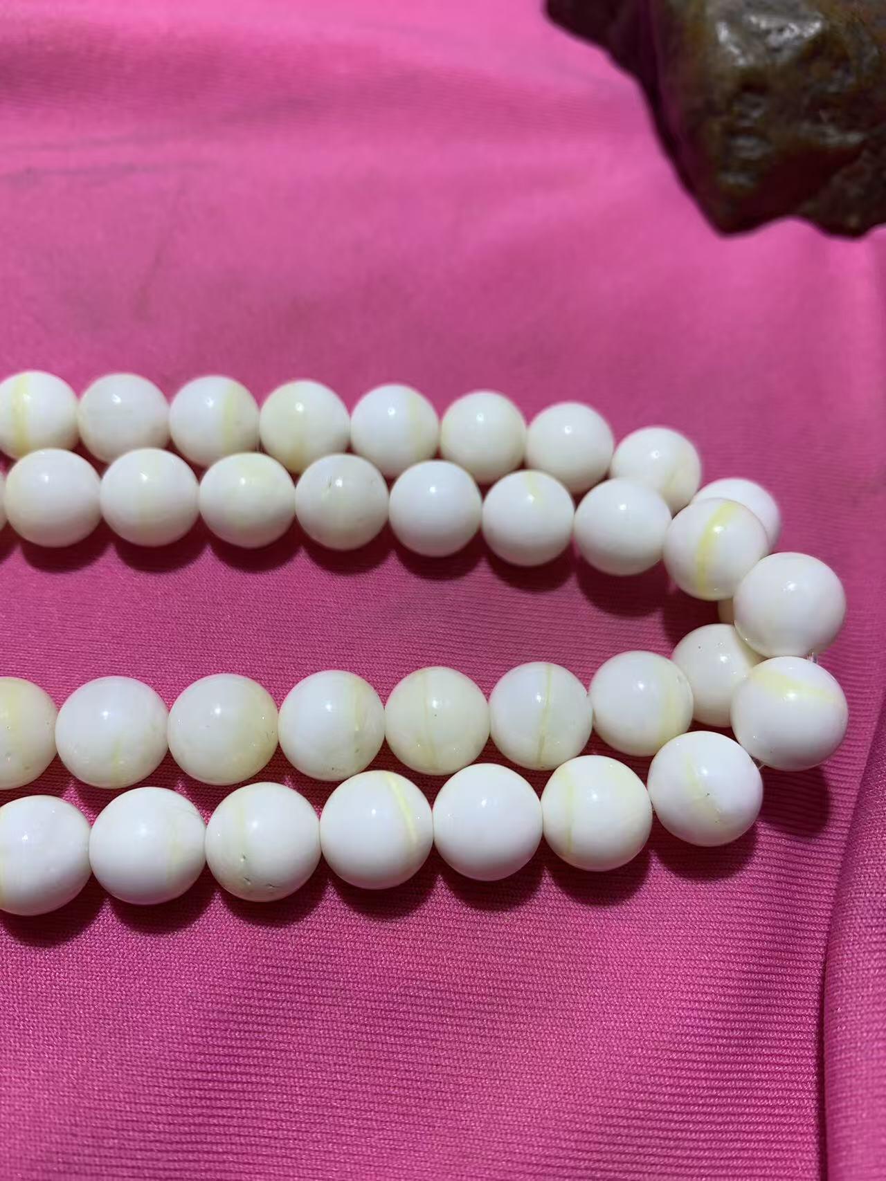 深海奶白飘黄贝金丝化玉108手串一条，