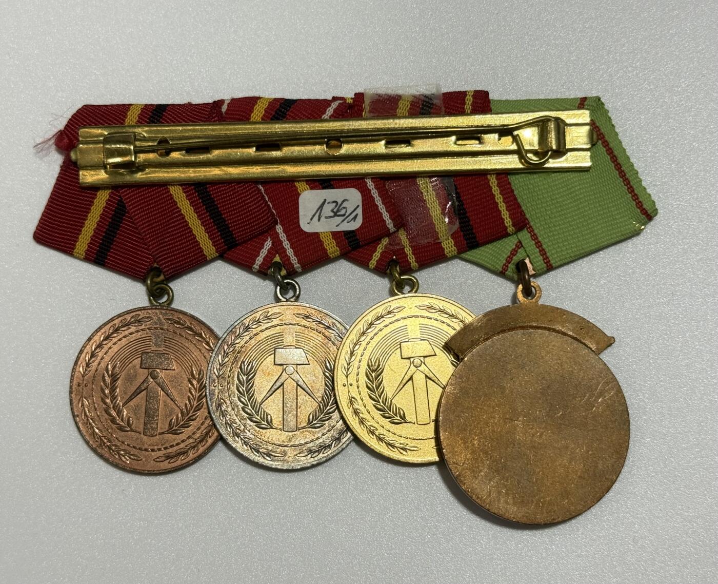 韵星假日精品2025秋季军品类拍卖会-- Rimey Holidays Boutique 2025 Autumn Militaria Sale 民主德国勋章联排、勋略   工战队优秀服役+忠诚服役联排  人民警察荣誉勋章+工战队功绩全套联排  勋略：国家荣誉、民警功勋 各类工战队功勋、服役   镀金帽徽