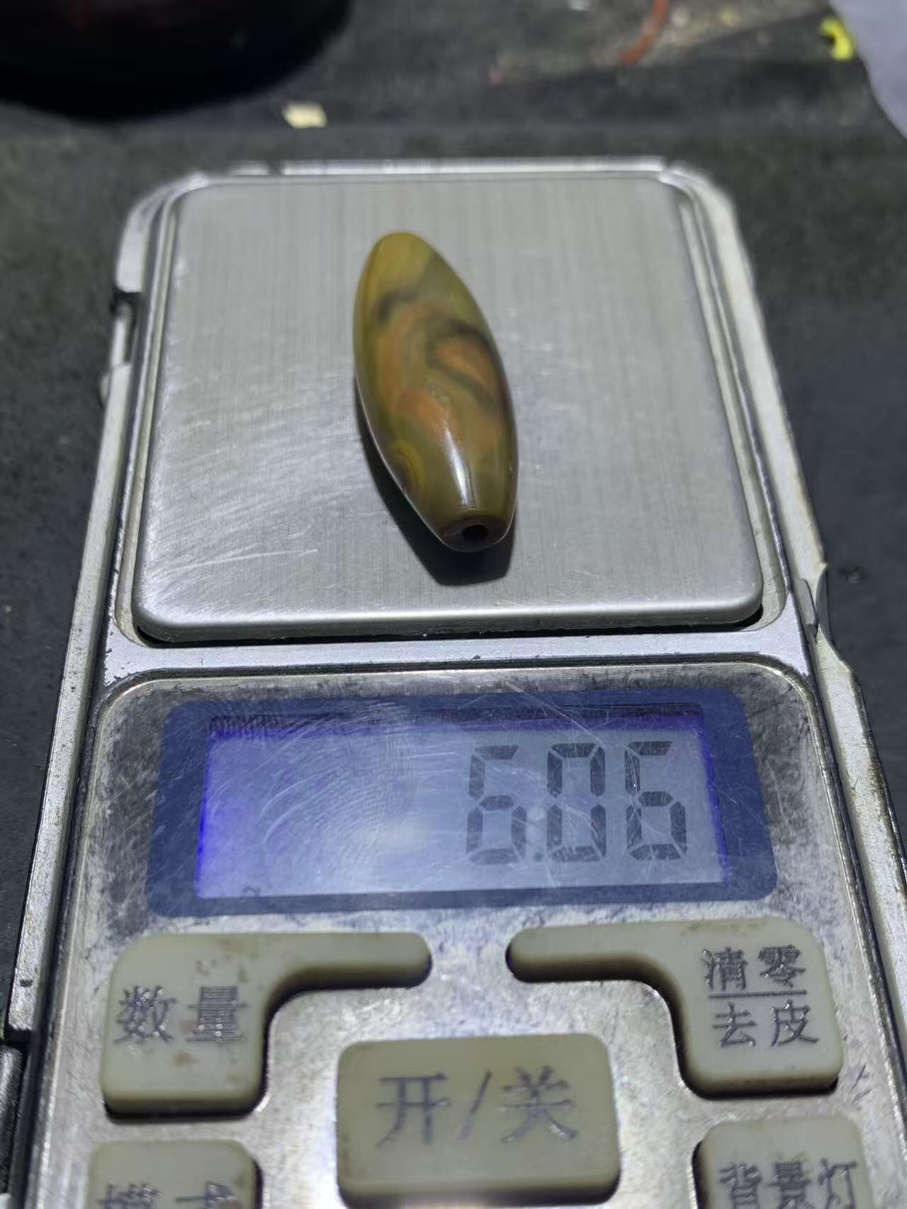 精美高玉化天眼纹战国红玛瑙勒子一颗