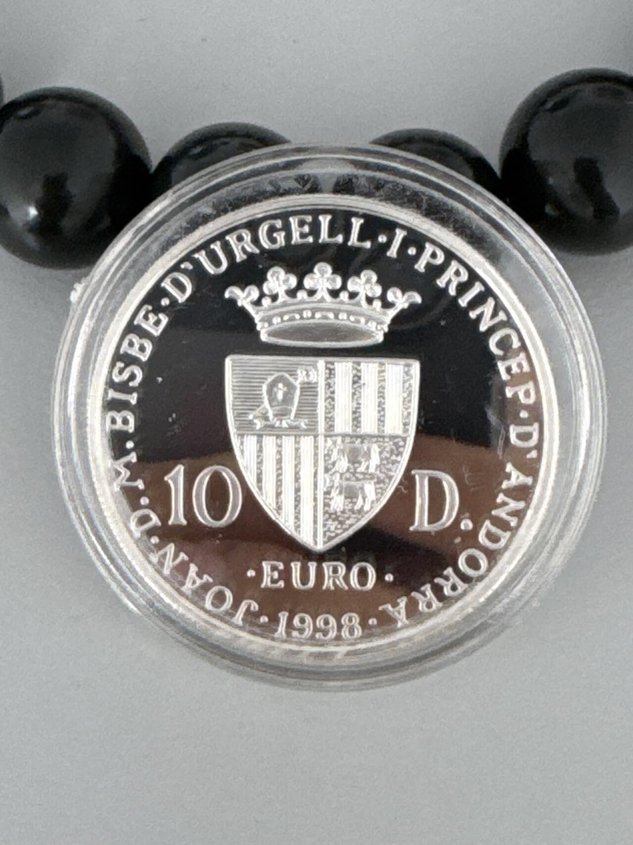 ❤️【币观天下】❤️ 第329期钱币拍卖- 2025.10.31周五晚上6点半场-长期征集拍品 1盎司安道尔1998年欧罗巴女神拿花坐像精制纪念银币925银31.47克直径38.61毫米