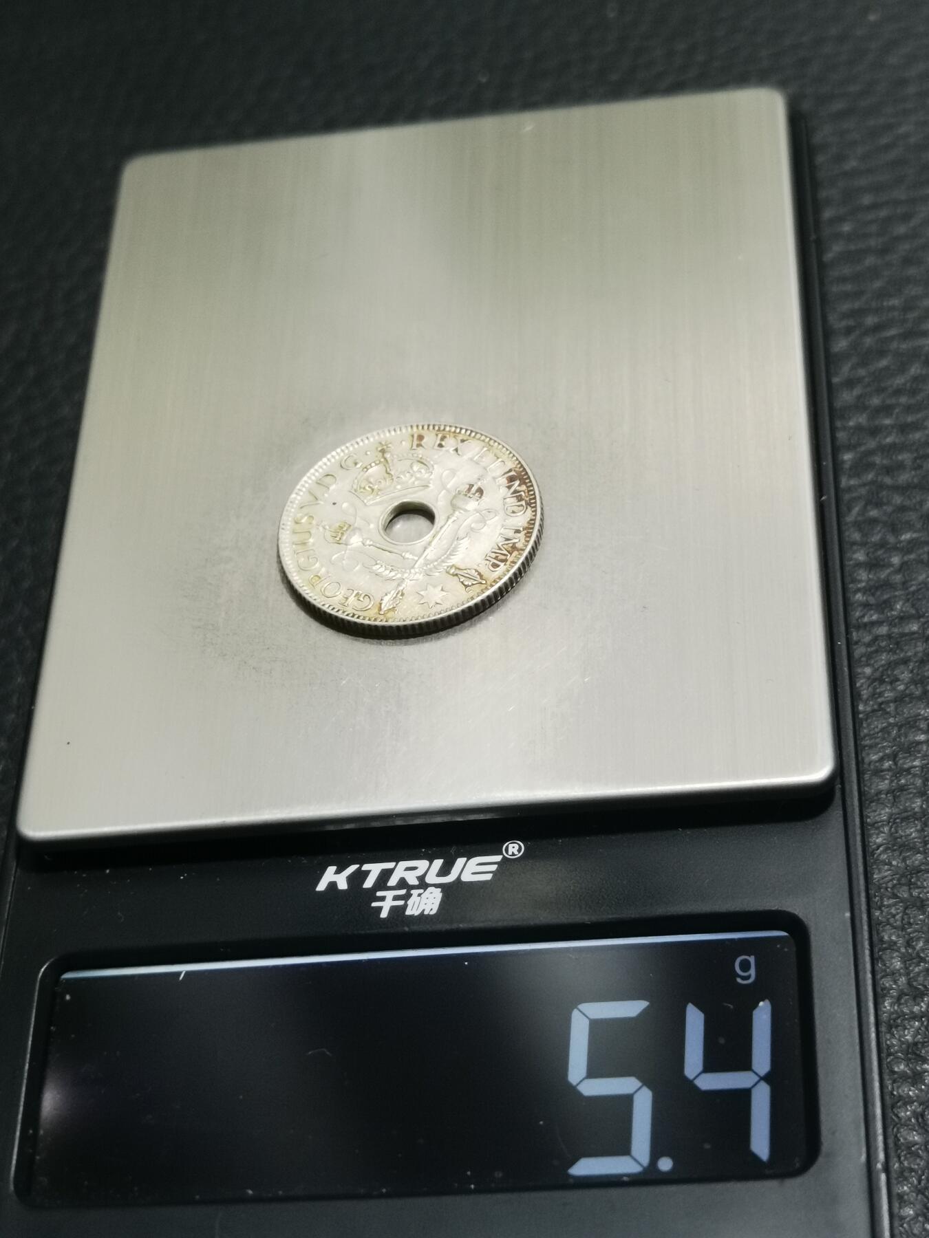 天下钱庄专场欢迎参拍 新几内亚中孔