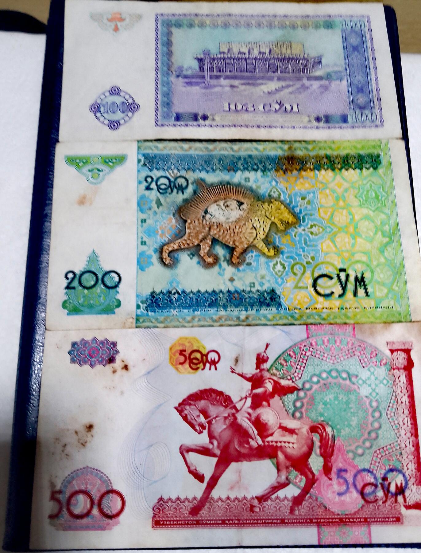 乌兹别克斯坦1994、97、99年100、200、500索姆“数三“兼狮子号靓品纸币