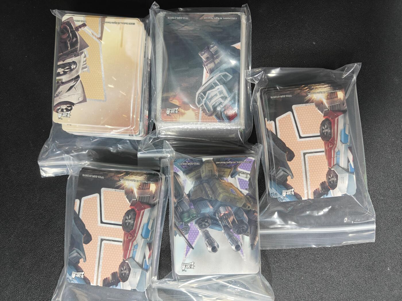 天玑星卡拍第133期《10.30周四截拍》持续收拍收评中 满赠卡需备注 卡游 变形金刚 SSR 大约200张 五包
