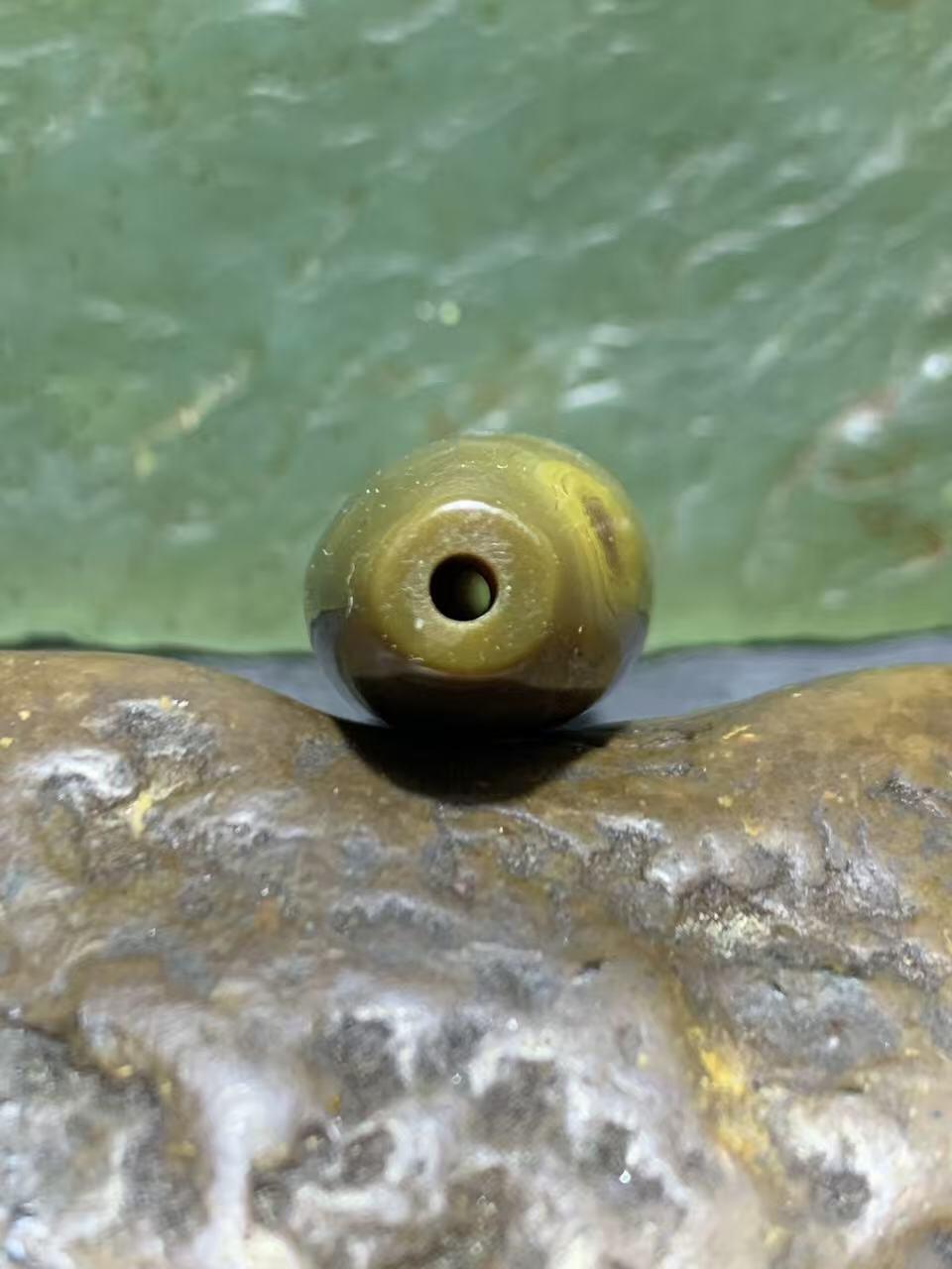 精美高玉化天眼纹战国红玛瑙勒子一颗