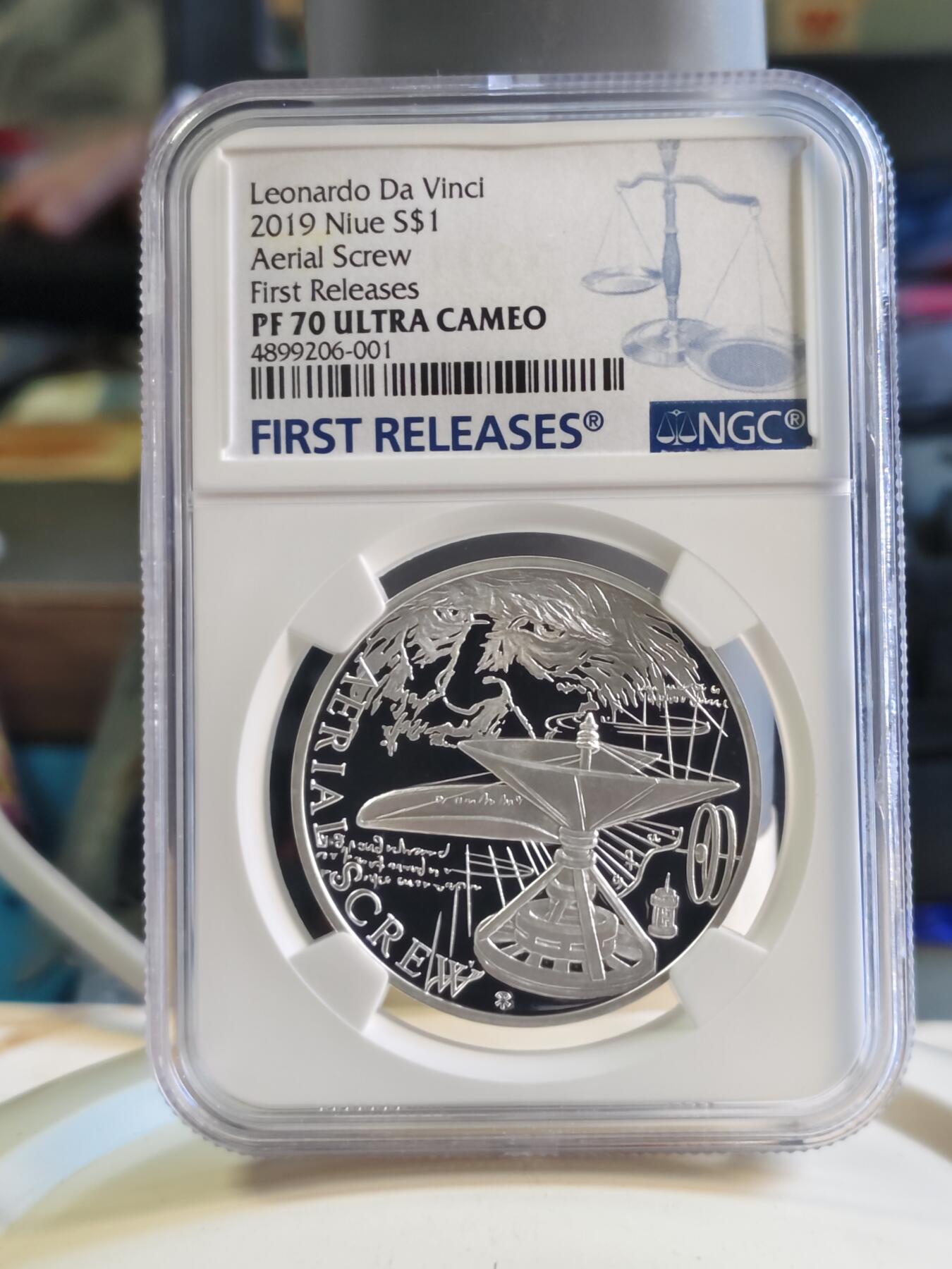 第180期拍卖【长期征集拍品】【北京币展专场】 1盎司NGC70首期蓝标纽埃2019年达芬奇科学发明系列1螺旋飞行器精制银币999银31.1克直径37毫米发行量仅1000枚