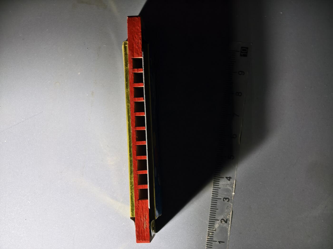 80期回流戒指饰品杂件纪念章丝路钱币专场 八十年代木制口琴