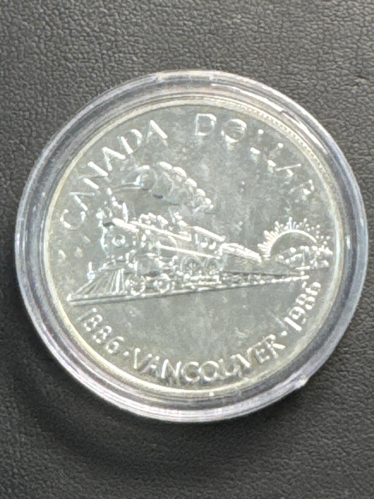 ❤️【币观天下】❤️ 第329期钱币拍卖- 2025.10.31周五晚上6点半场-长期征集拍品 克劳斯世界硬币大赛获奖最佳银币和最佳克朗币两项大奖加拿大1986年温哥华建城暨铁路通车100周年银币500银23.33克直径36.07毫米