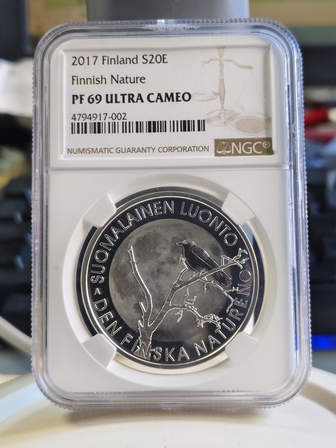 第180期拍卖【长期征集拍品】【北京币展专场】 获奖芬兰2017年自然系列乌鸦20欧NGC69精制银币925银25.5克直径38.6毫米