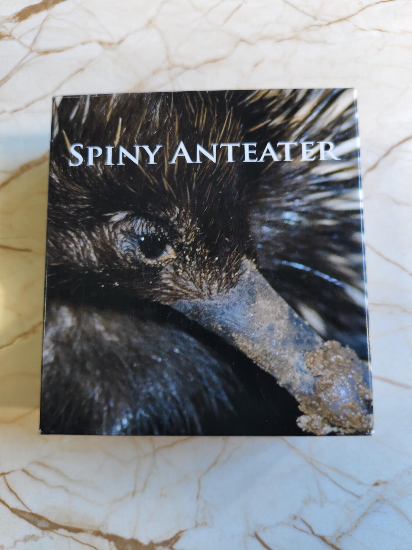 第180期拍卖【长期征集拍品】【北京币展专场】 镶嵌真钻石（有钻石证书）1盎司原厂盒证巴布亚新几内亚2012年多刺食蚁兽仿古银币999银31.1克直径38.61毫米发行量仅1000枚