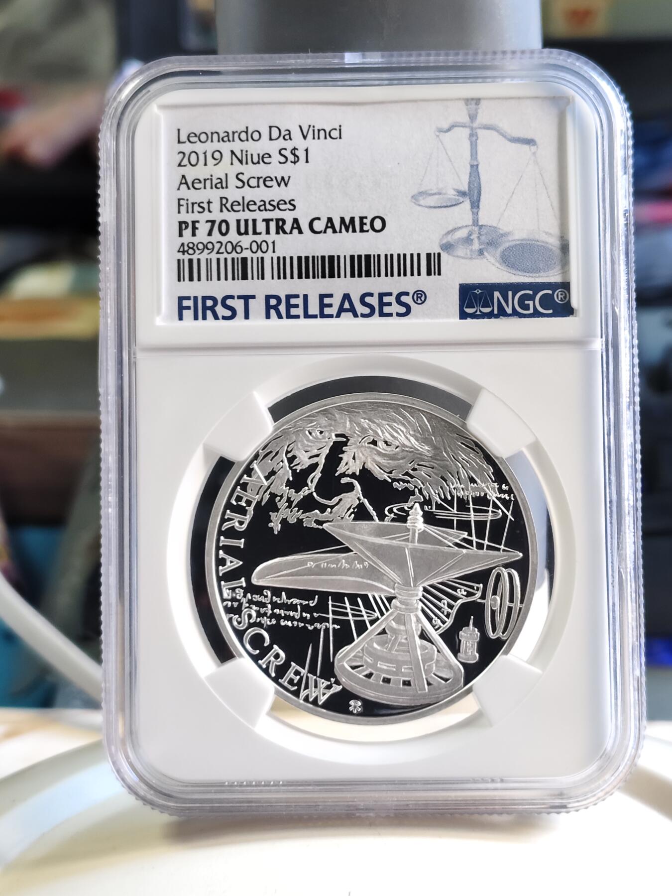 第180期拍卖【长期征集拍品】【北京币展专场】 1盎司NGC70首期蓝标纽埃2019年达芬奇科学发明系列1螺旋飞行器精制银币999银31.1克直径37毫米发行量仅1000枚
