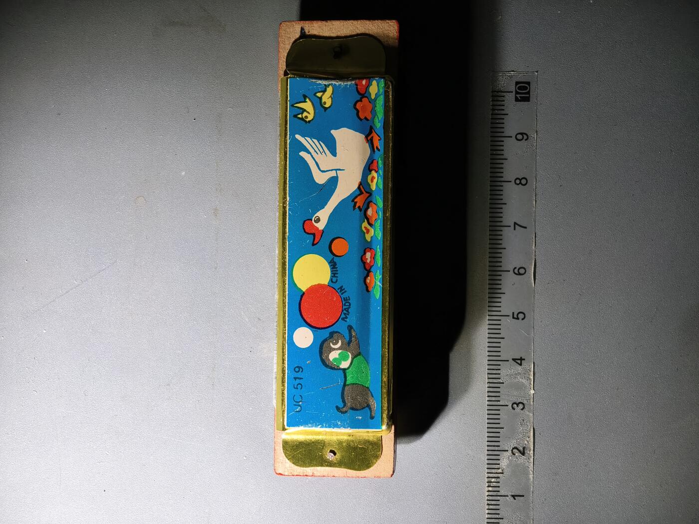 80期回流戒指饰品杂件纪念章丝路钱币专场 八十年代木制口琴