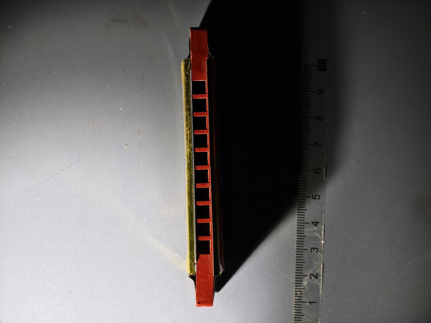 80期回流戒指饰品杂件纪念章丝路钱币专场 八十年代木制口琴