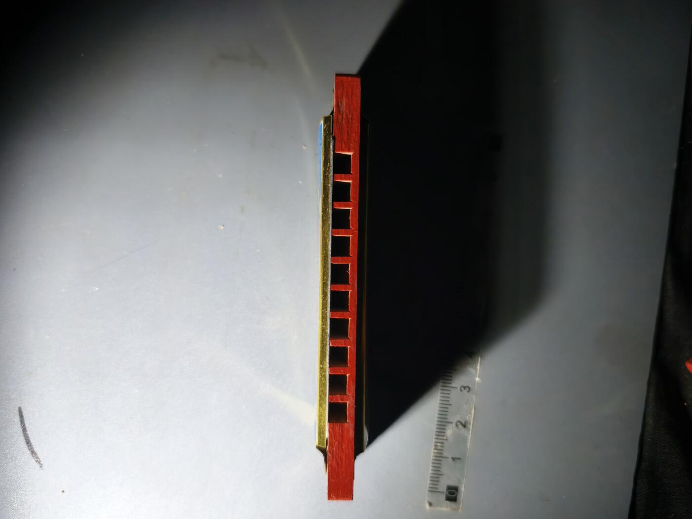 80期回流戒指饰品杂件纪念章丝路钱币专场 八十年代木制口琴