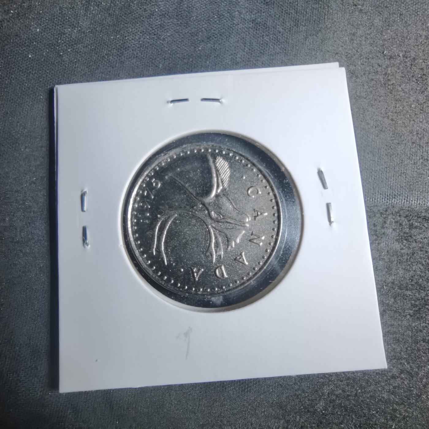 沼泽如烟--第885场 加拿大币形章