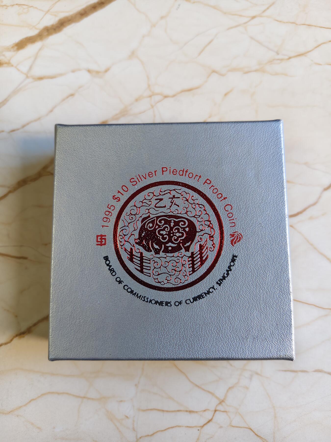 第180期拍卖【长期征集拍品】【北京币展专场】 1995年新加坡10元加厚精制银币 猪年 2盎司999银 盒证全