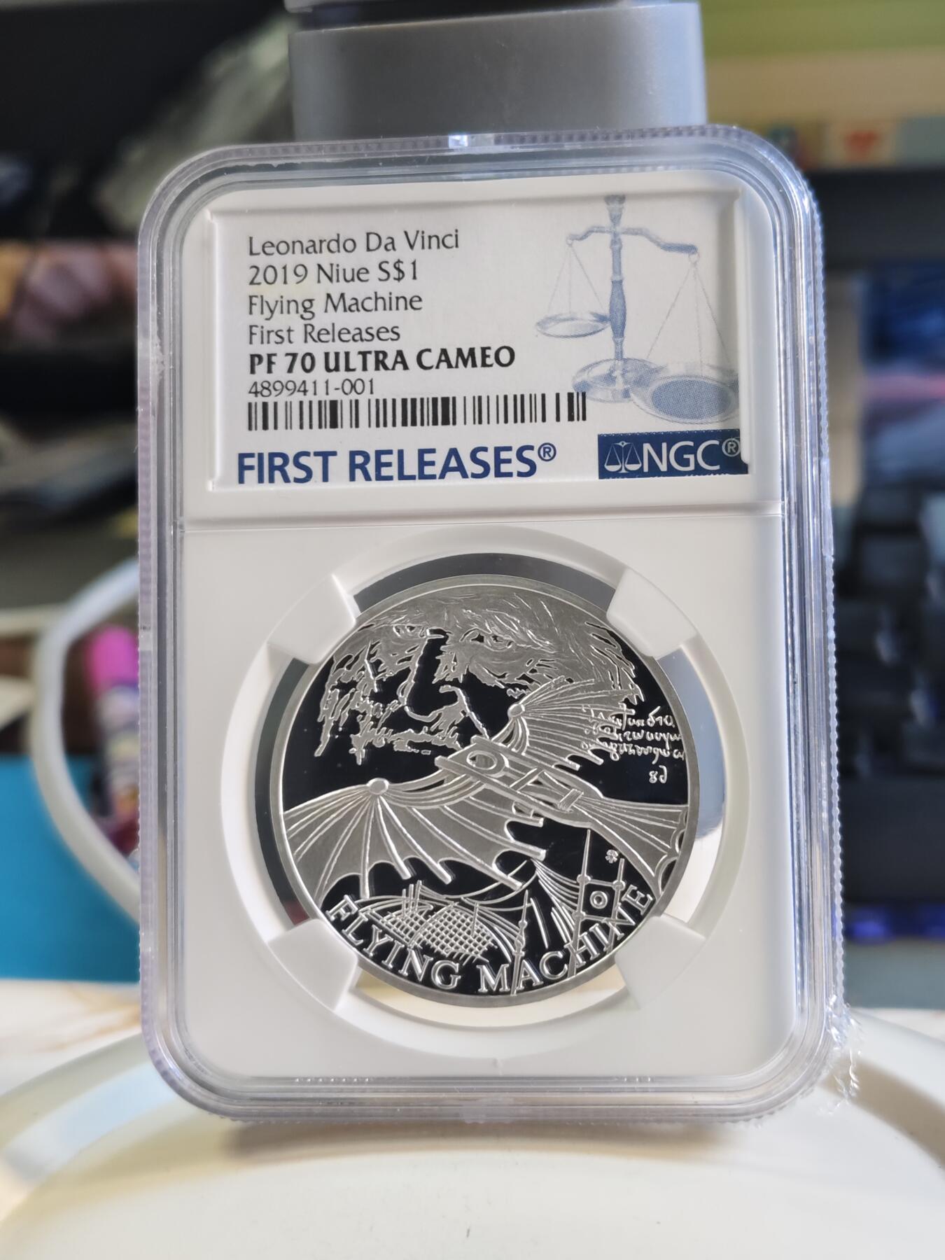 第180期拍卖【长期征集拍品】【北京币展专场】 1盎司NGC70首期蓝标纽埃2019年达芬奇科学发明系列2机械飞行器精制银币999银31.1克直径37毫米发行量仅1000枚