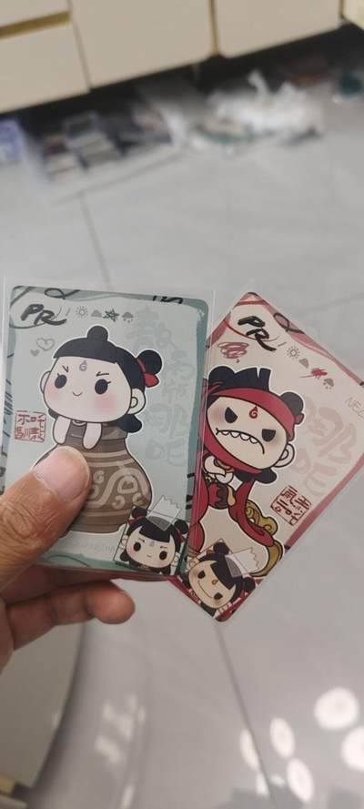 秋原瞳的小店第二十七期（持续收拍，11月秋意正浓，冬欲近，暖心囤卡好时光） - 卡游哪吒活动卡一对——皮影哪吒