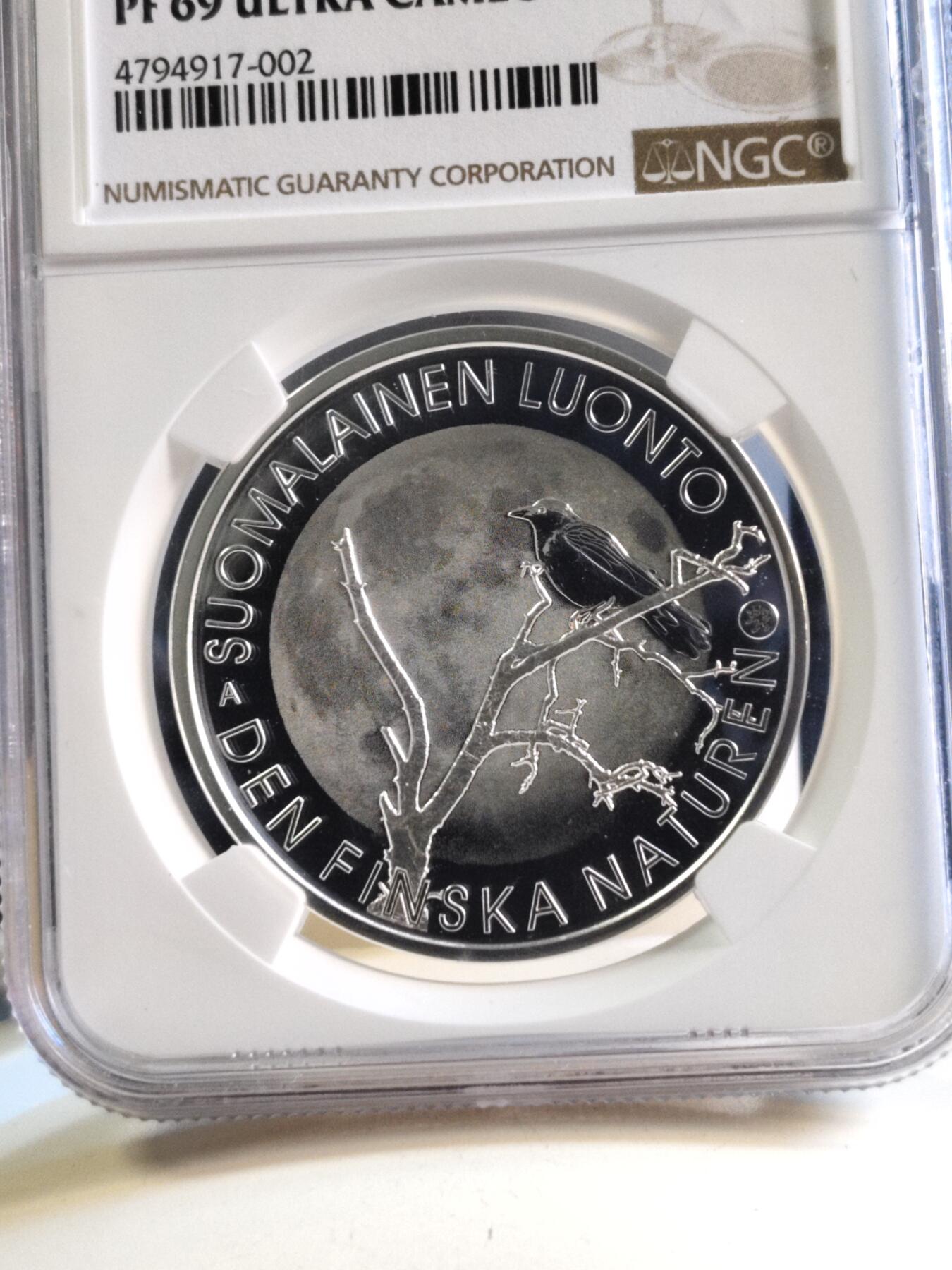 第180期拍卖【长期征集拍品】【北京币展专场】 获奖芬兰2017年自然系列乌鸦20欧NGC69精制银币925银25.5克直径38.6毫米