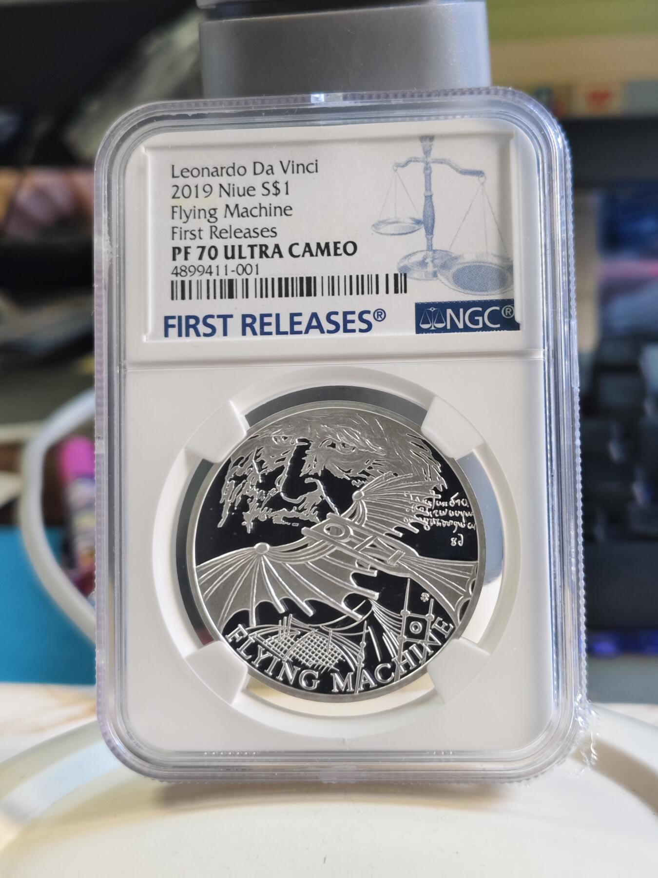 第180期拍卖【长期征集拍品】【北京币展专场】 1盎司NGC70首期蓝标纽埃2019年达芬奇科学发明系列2机械飞行器精制银币999银31.1克直径37毫米发行量仅1000枚
