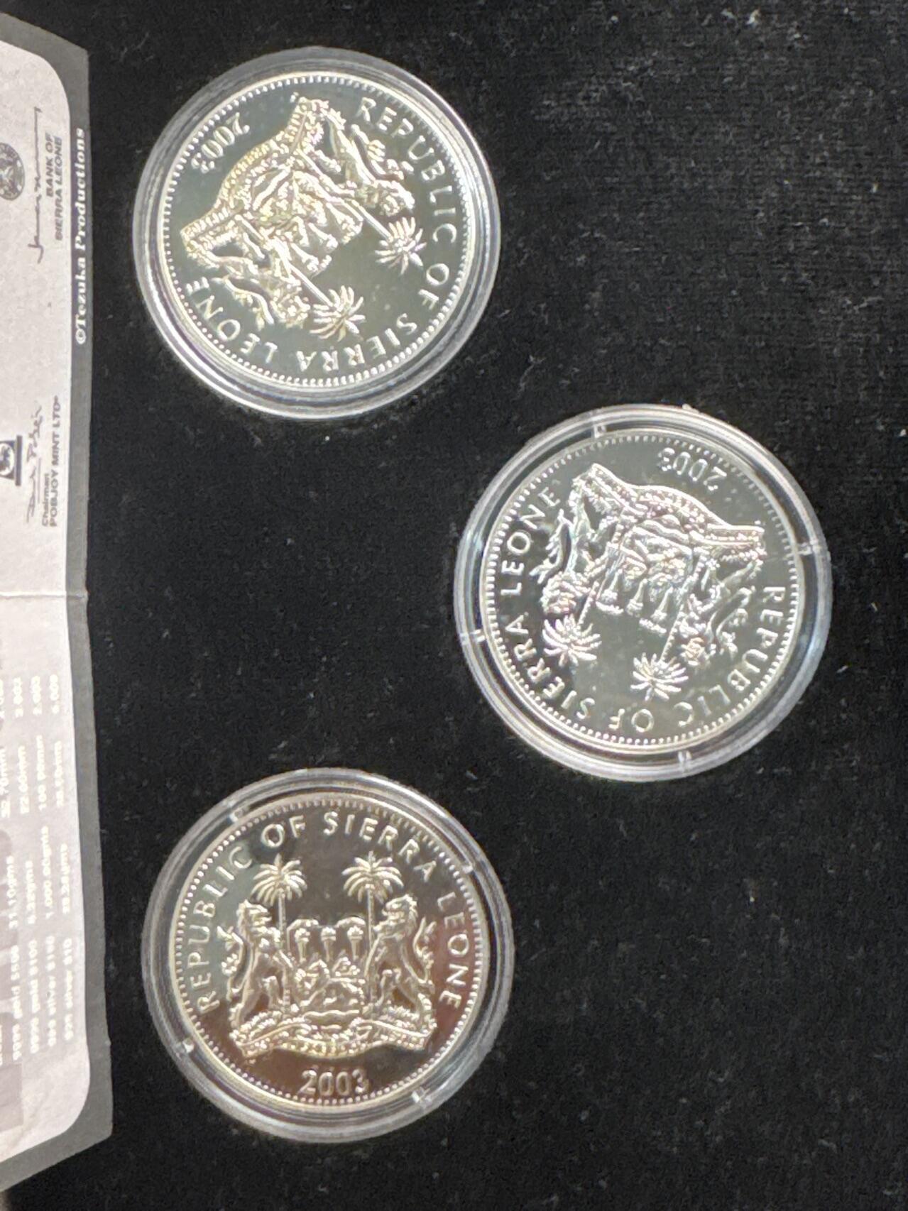 ❤️【币观天下】❤️ 第329期钱币拍卖- 2025.10.31周五晚上6点半场-长期征集拍品 稀有品种英国普乔伊造币厂原盒原证塞拉利昂2003年铁臂阿童木彩色精制银币全套3枚925银28.28克直径38.6毫米