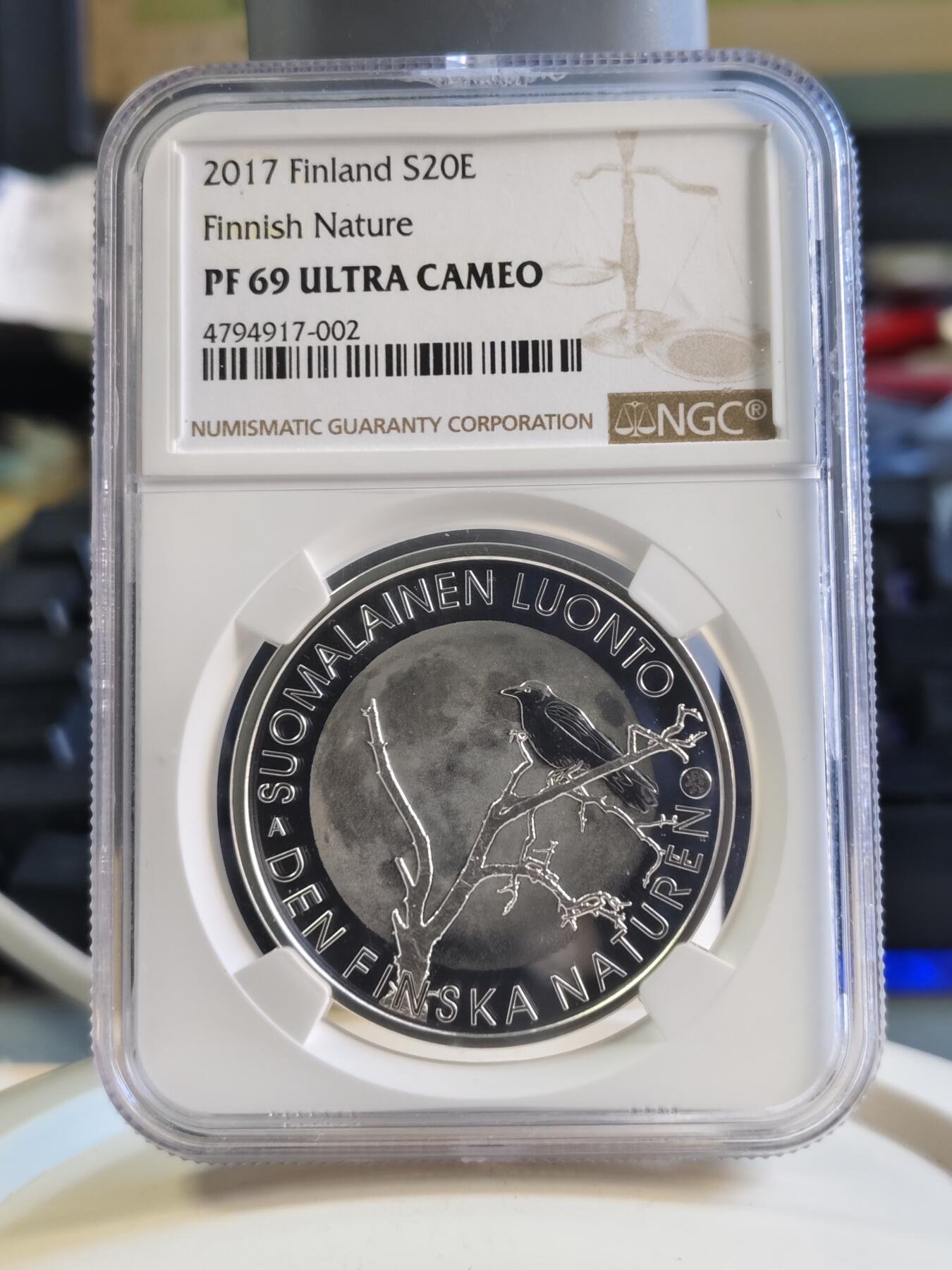 第180期拍卖【长期征集拍品】【北京币展专场】 获奖芬兰2017年自然系列乌鸦20欧NGC69精制银币925银25.5克直径38.6毫米