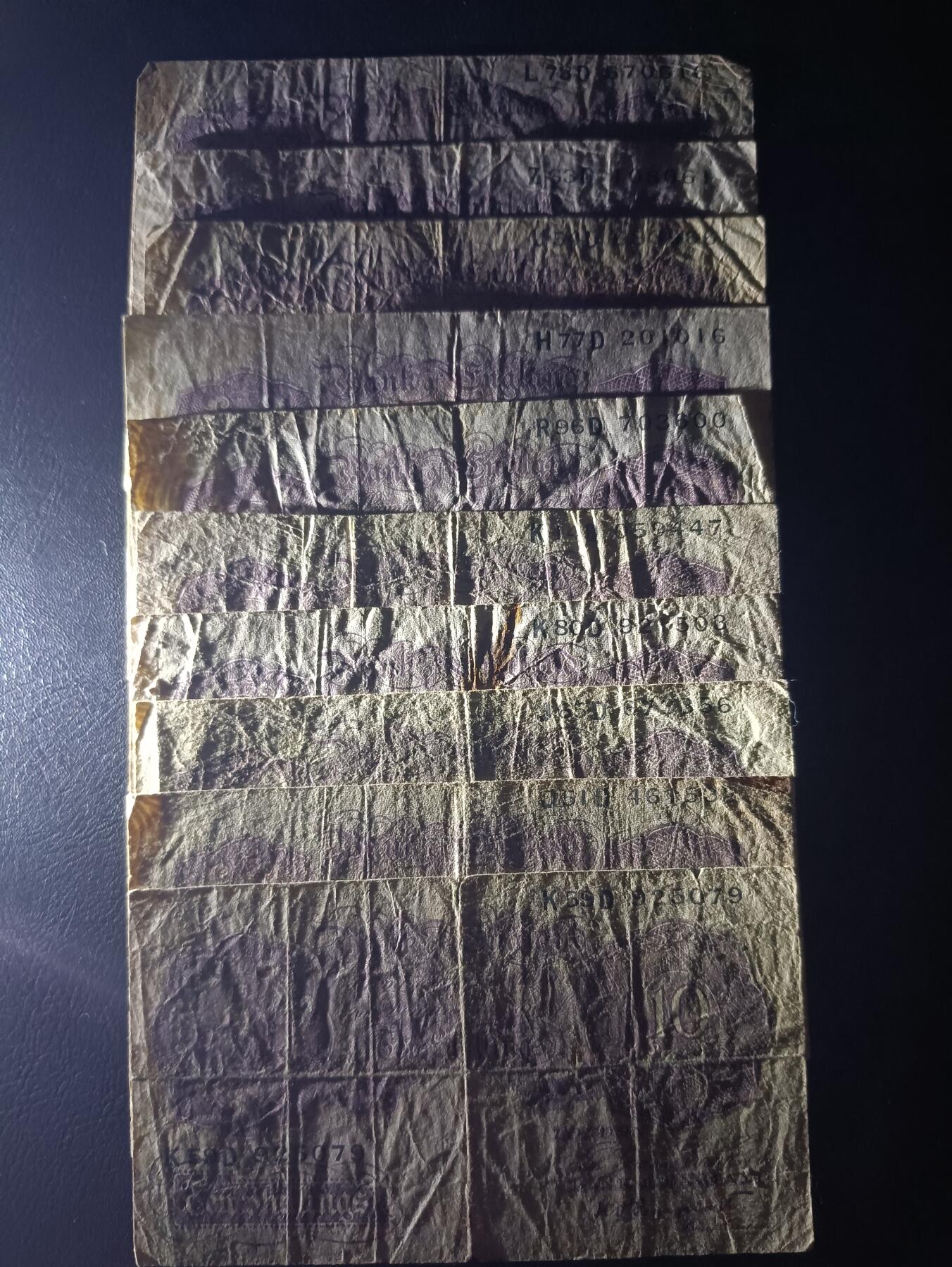 2025十一月第一期，总199期 英格兰战时A序列10先令流通品相批量十张，有别于战前战后普通的红色版本用紫色印刷