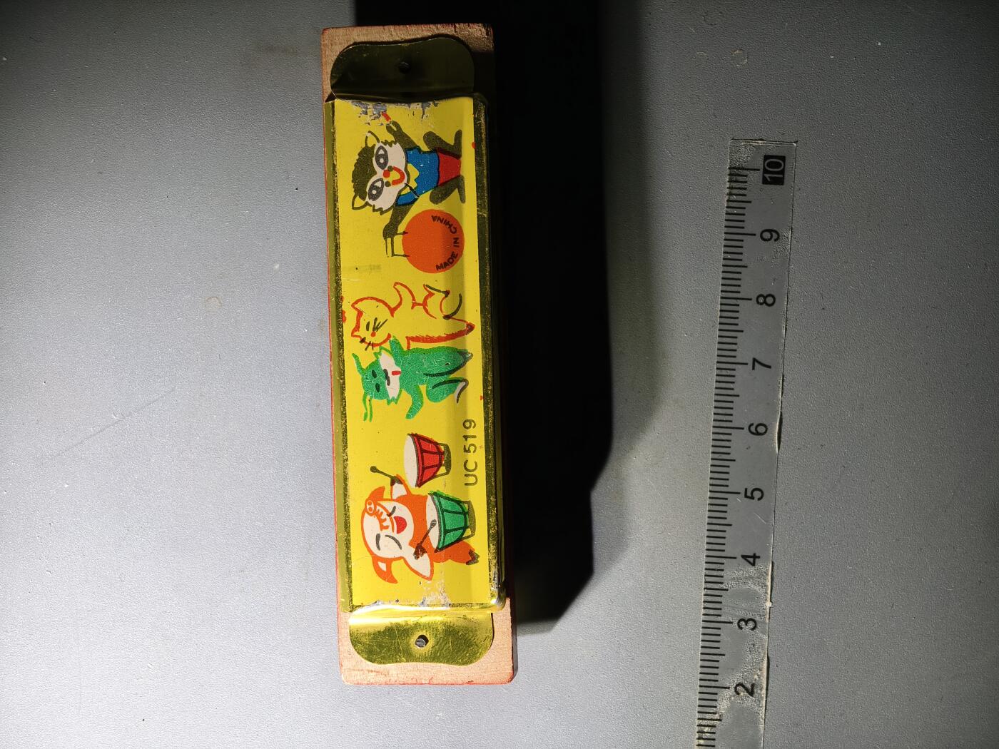 80期回流戒指饰品杂件纪念章丝路钱币专场 八十年代木制口琴