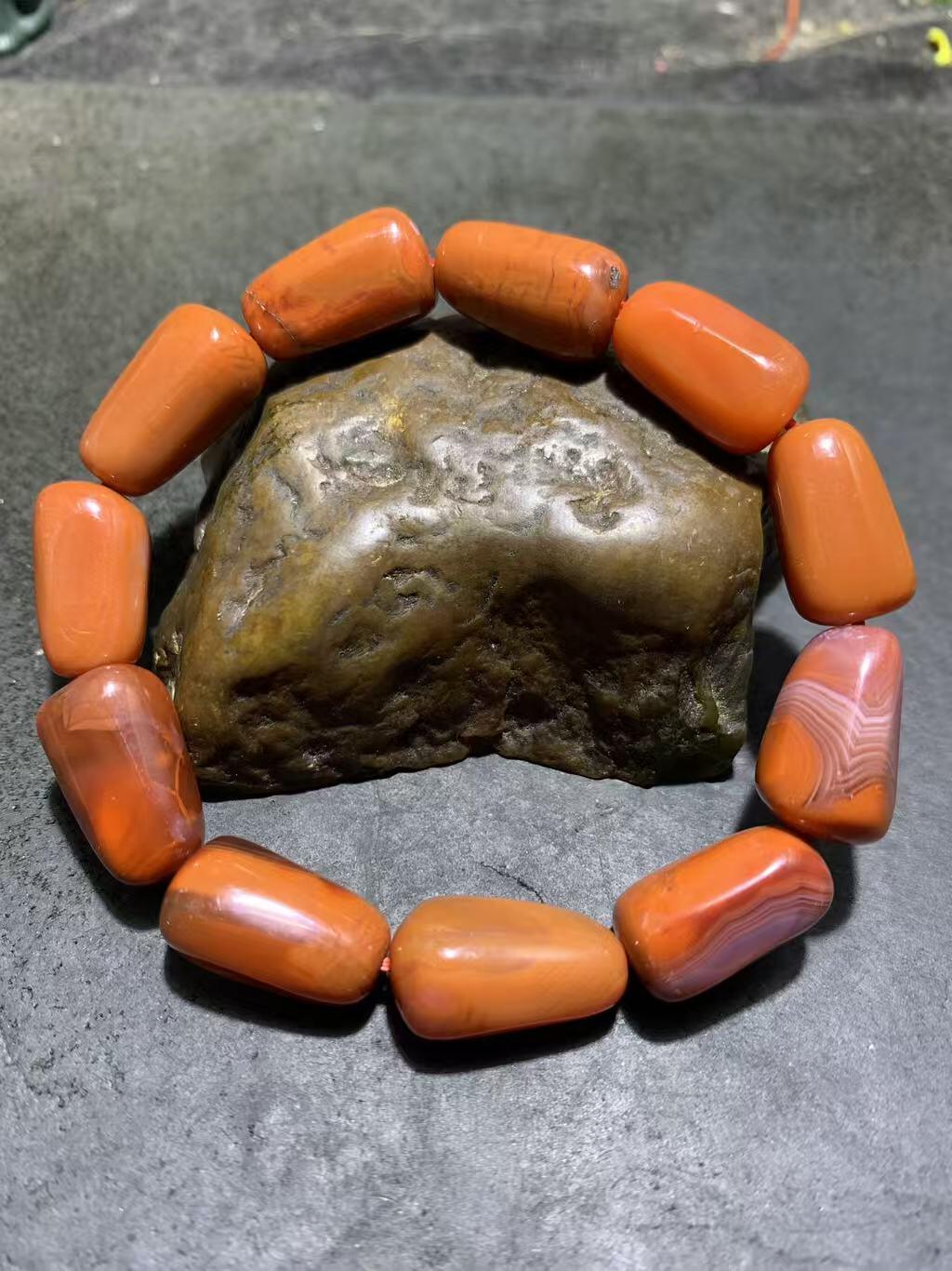 川料柿子红南红玛瑙随形单圈手串一条，