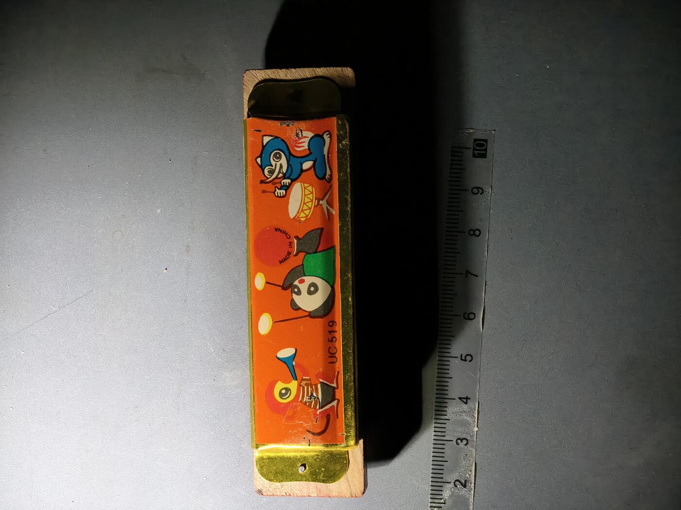 80期回流戒指饰品杂件纪念章丝路钱币专场 八十年代木制口琴