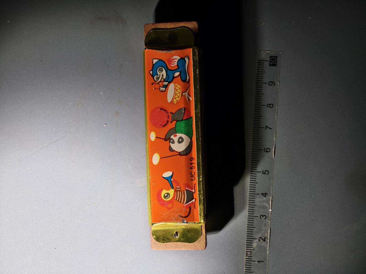 80期回流戒指饰品杂件纪念章丝路钱币专场 八十年代木制口琴