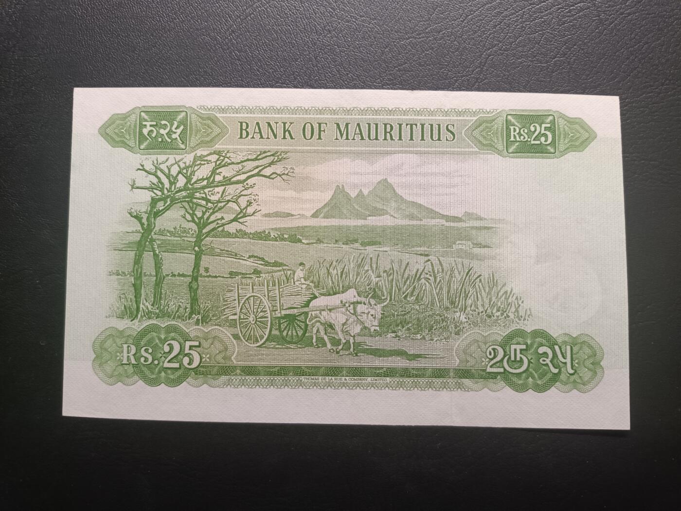 2025十一月第一期，总199期 毛里求斯1967版25卢比UNC-，戎装女王和牛车