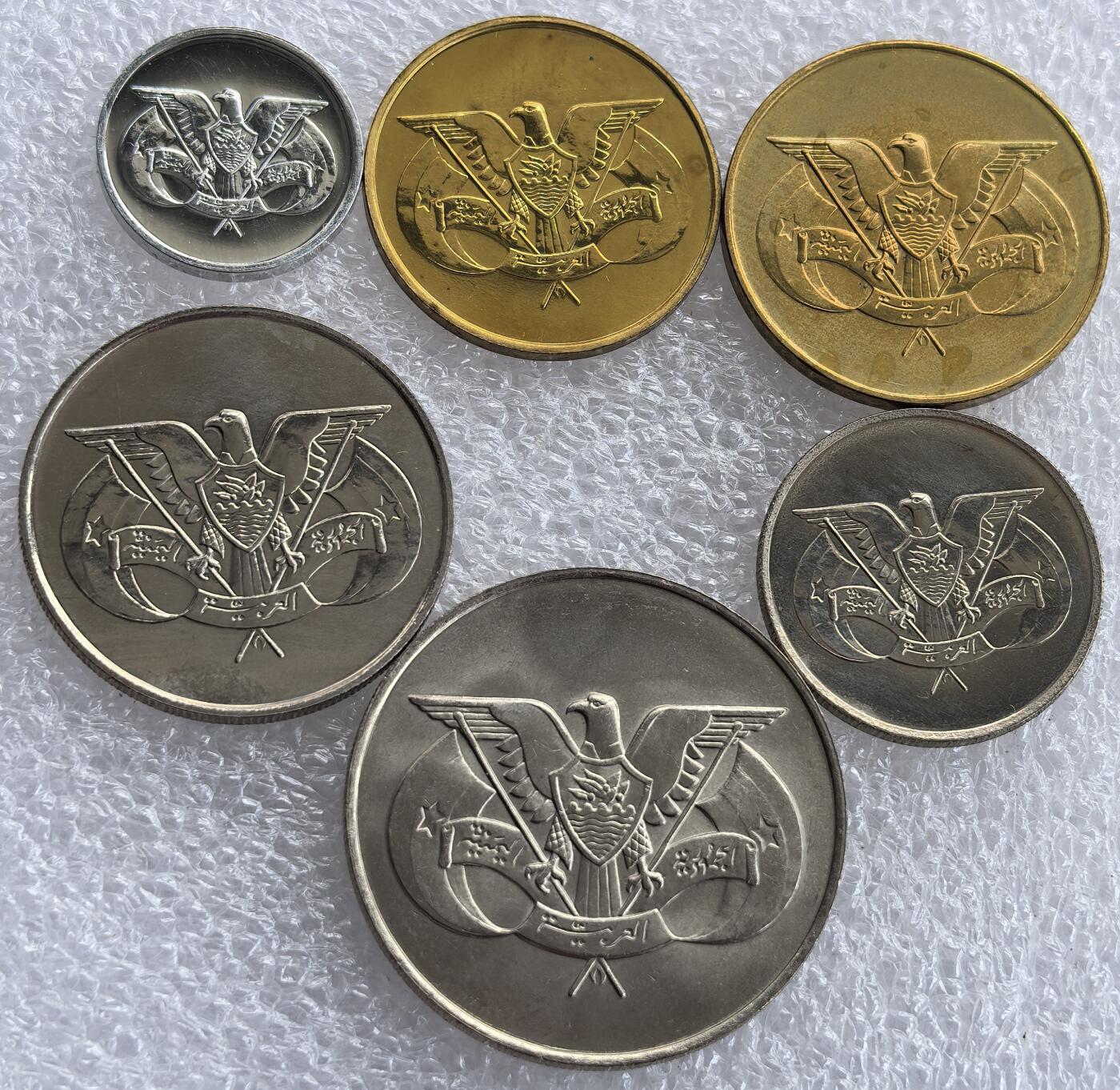 埃及、德属东非、匈牙利、葡萄牙、沙俄古银币古铜币，周五晚上九点倒数截拍，满百包邮，可寄存半年，喜欢朋友微信扫描二维码可直接参拍 阿拉伯也门共和国1974年-1985年精制6枚套