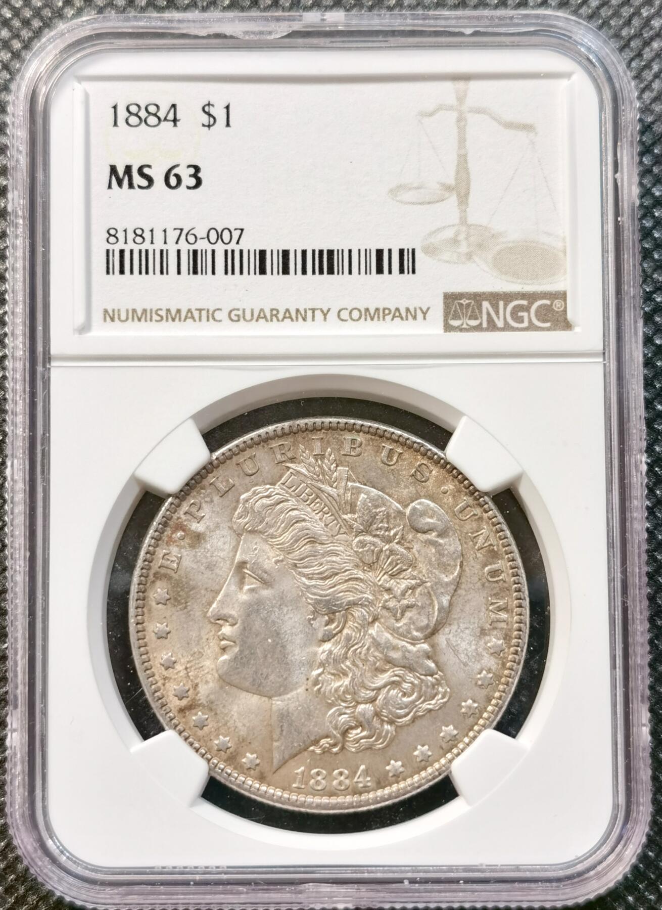 甄臻铺-世界币章拍卖（第37期），送拍享返佣金等优惠多多 NGC-MS63 1884美国摩根一元银币，双面五彩，小版