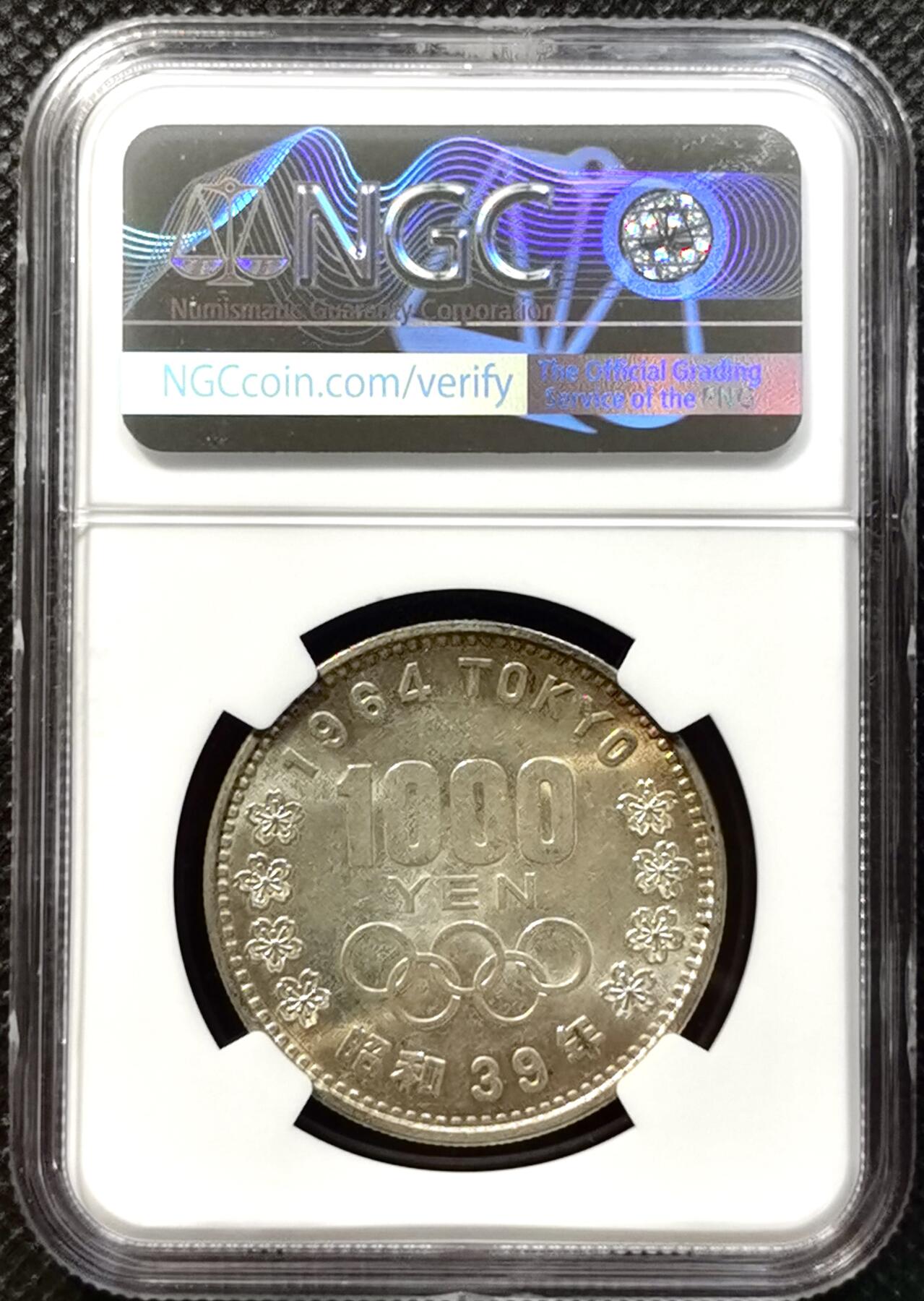甄臻铺-世界币章拍卖（第37期），送拍享返佣金等优惠多多 NGC-MS62日本1964年东京奥运1000元银币