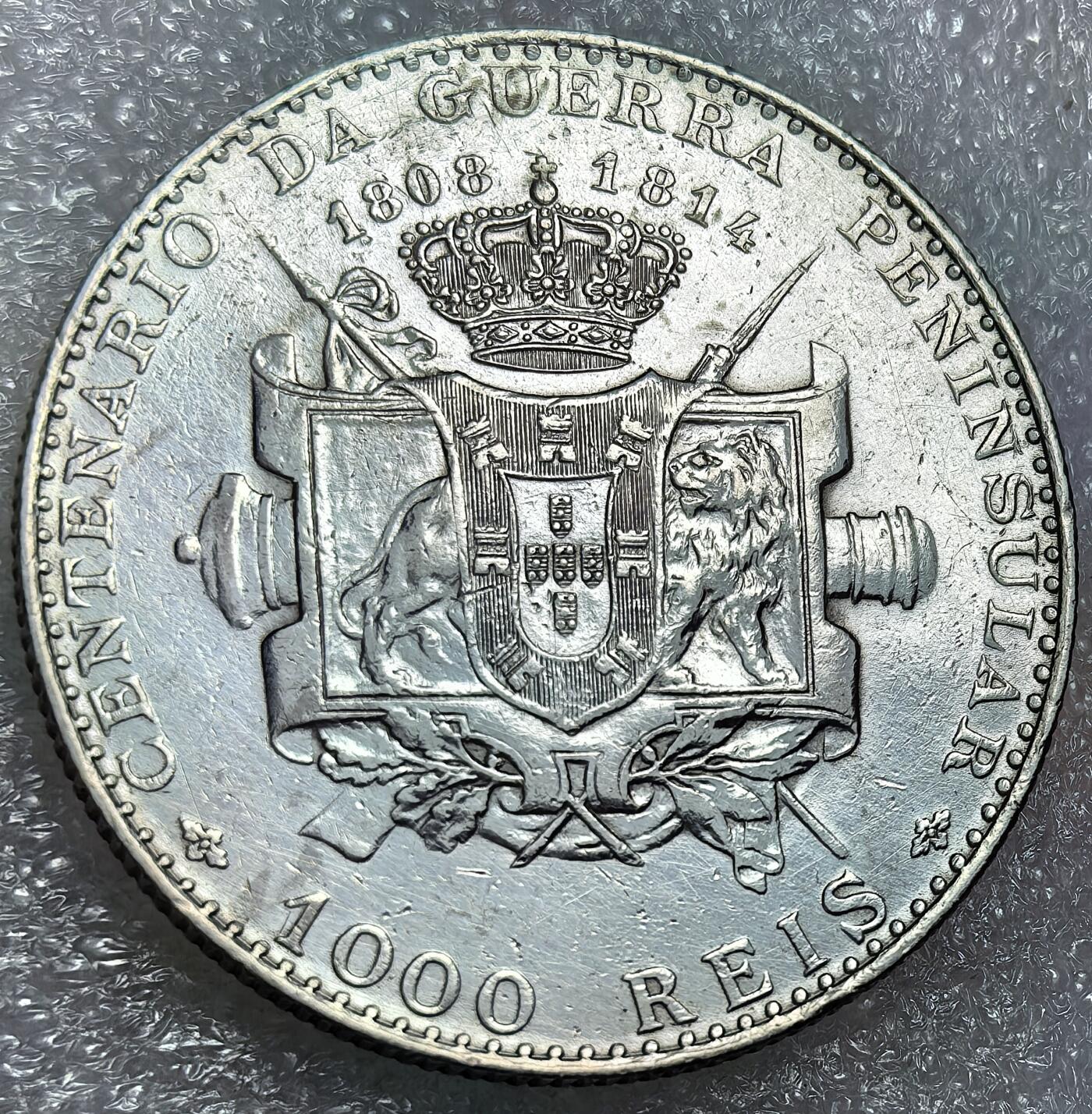 埃及、德属东非、匈牙利、葡萄牙、沙俄古银币古铜币，周五晚上九点倒数截拍，满百包邮，可寄存半年，喜欢朋友微信扫描二维码可直接参拍 全新好品葡萄牙1910年1000瑞斯半岛战争纪念大银币发行20万枚,km558