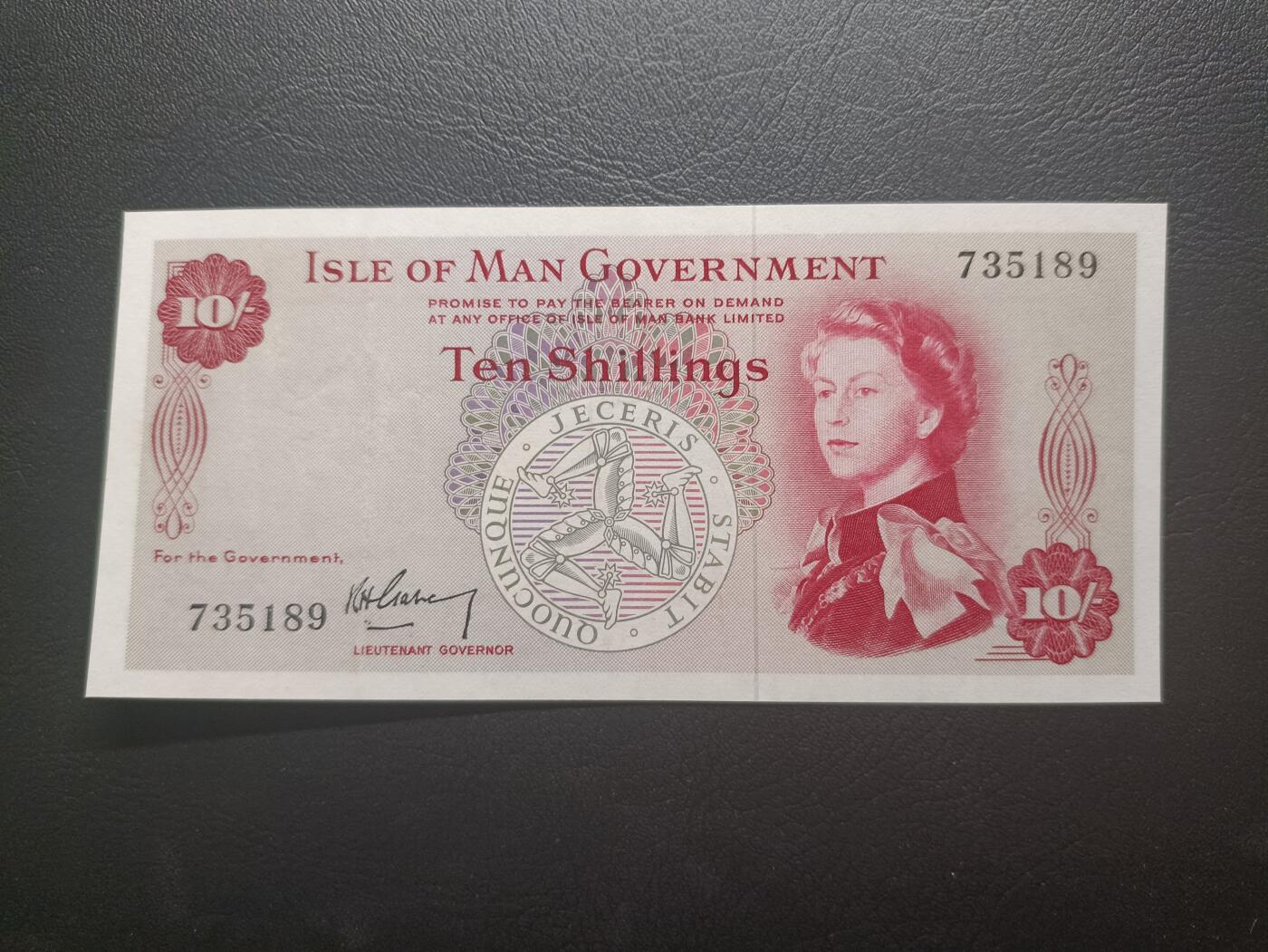 2025十一月第一期，总199期 马恩岛1961版10先令AUNC，戎装女王和传统帆船，早期旧币值品种